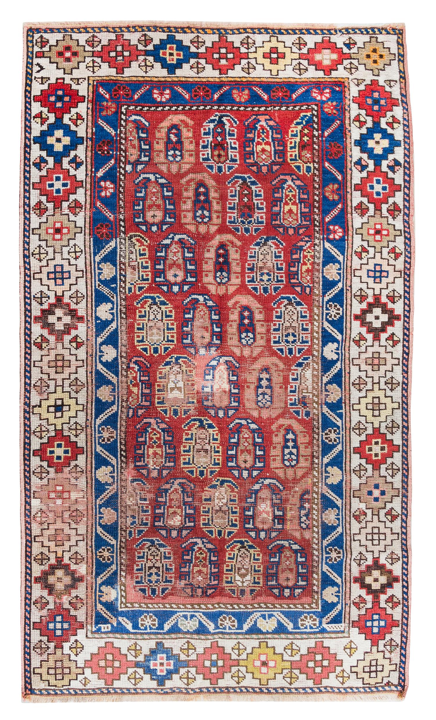 A Caucasian Wool Rug 5 feet 5 inches x 3 feet 3 inches. — FIRST HALF 20TH CENTURY