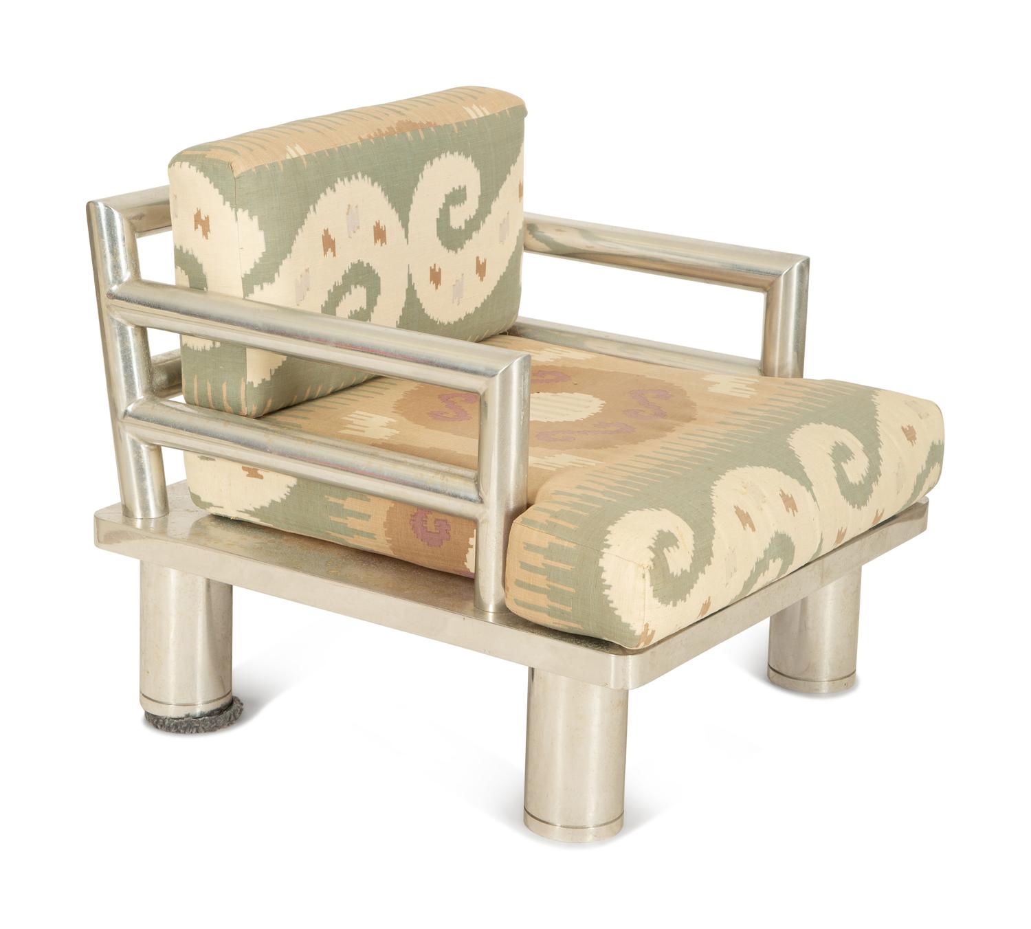 A Tubular Chromed Metal Club Chair with Upholstered Seat Cushions — 20th Century