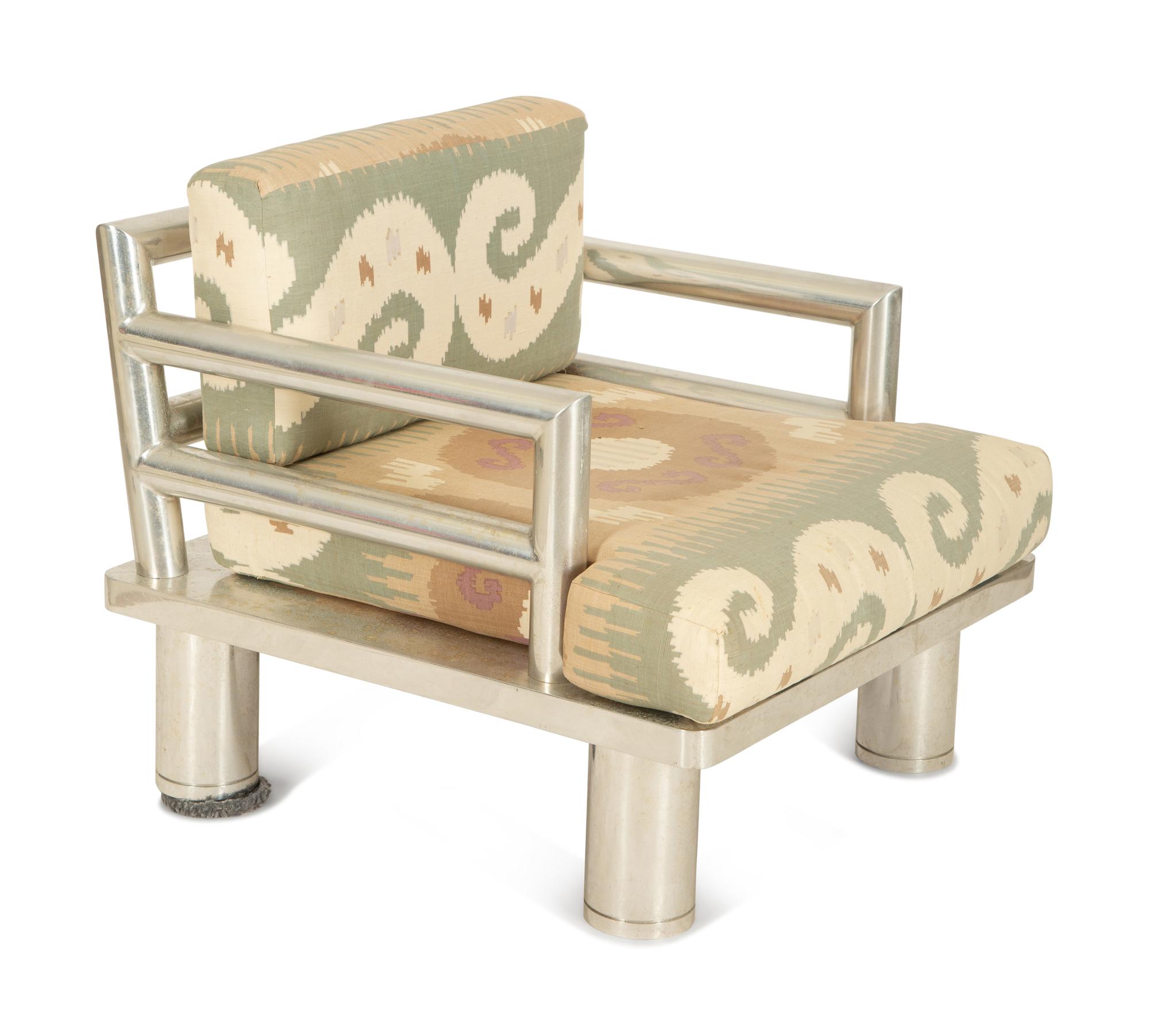 A Tubular Chromed Metal Club Chair with Upholstered Seat Cushions — 20th Century