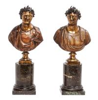 Two Continental Composite Busts Height overall 16 inches.