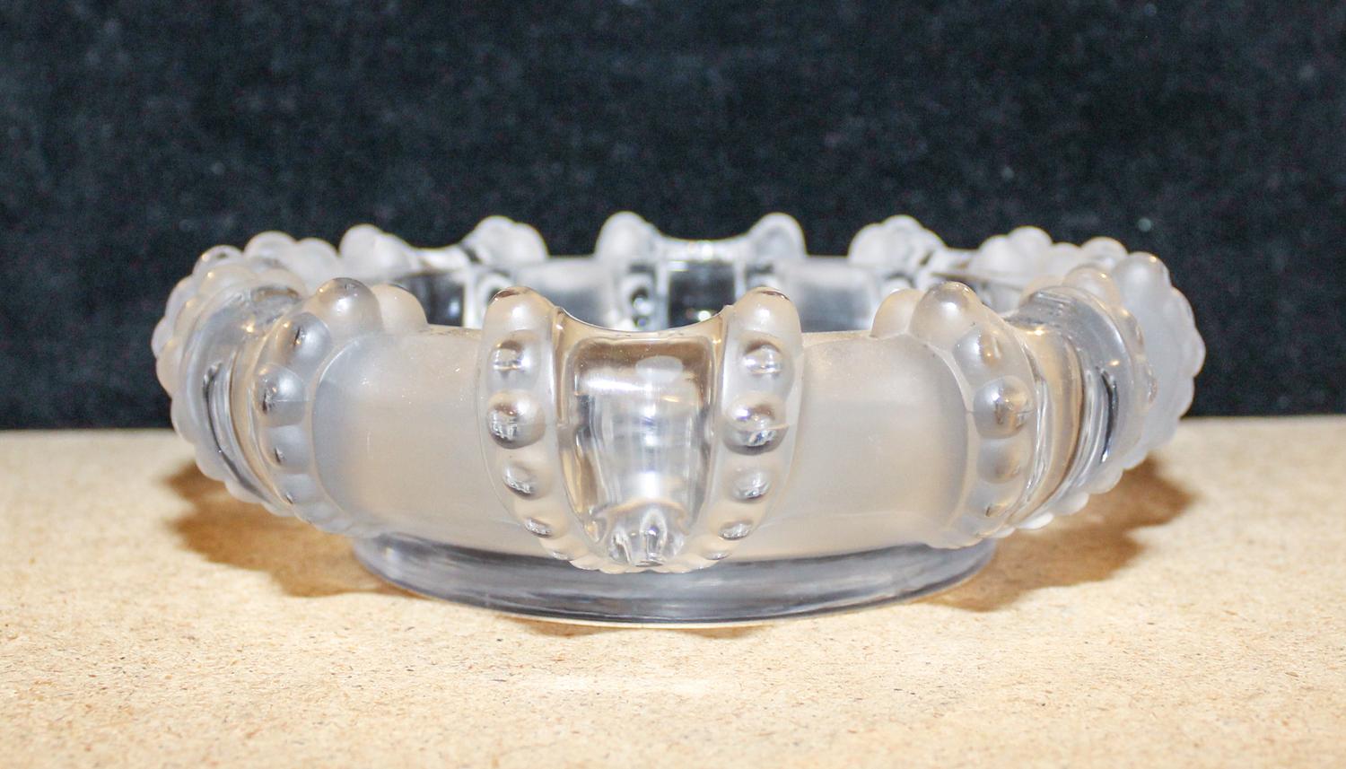 A Lalique Molded and Frosted Glass Bowl Diameter 7 3/4 inches.