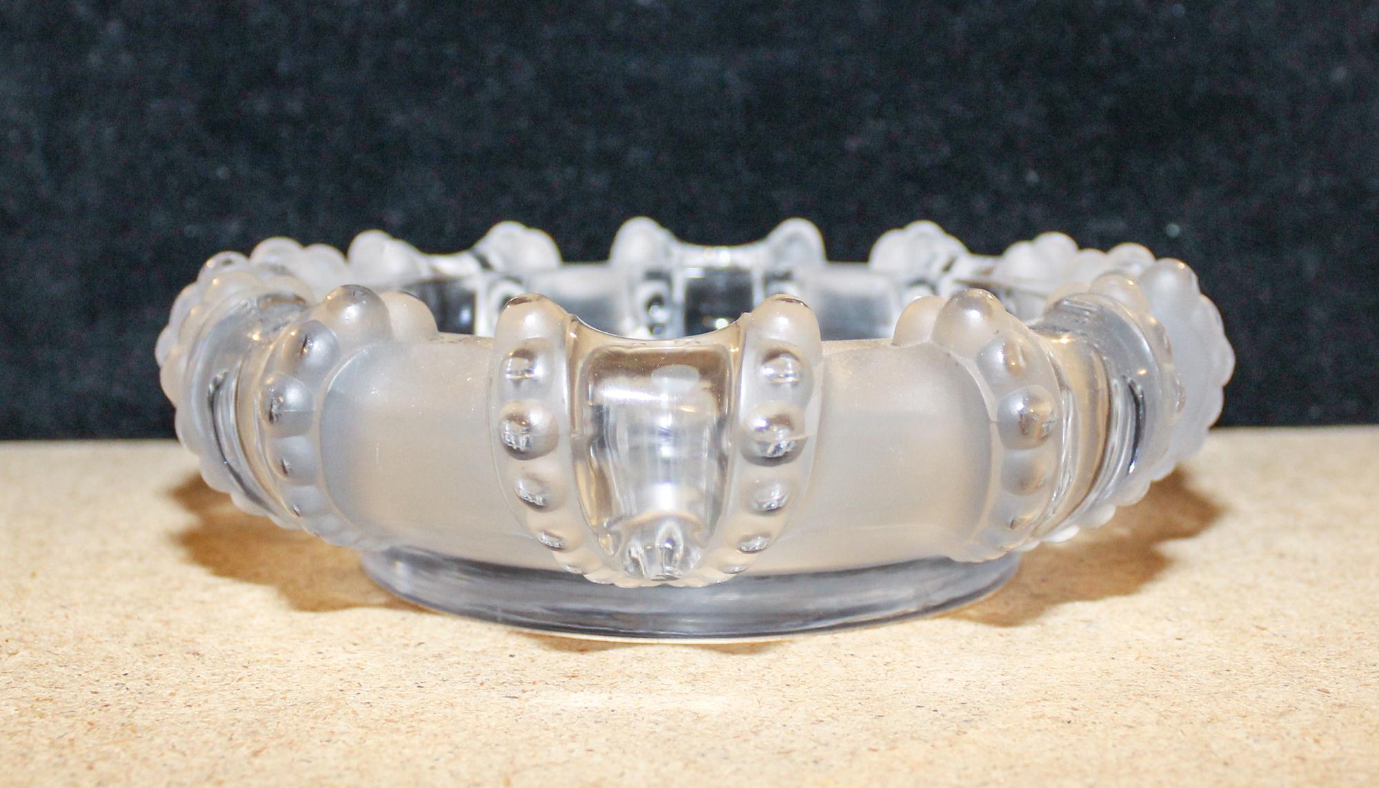 A Lalique Molded and Frosted Glass Bowl Diameter 7 3/4 inches.