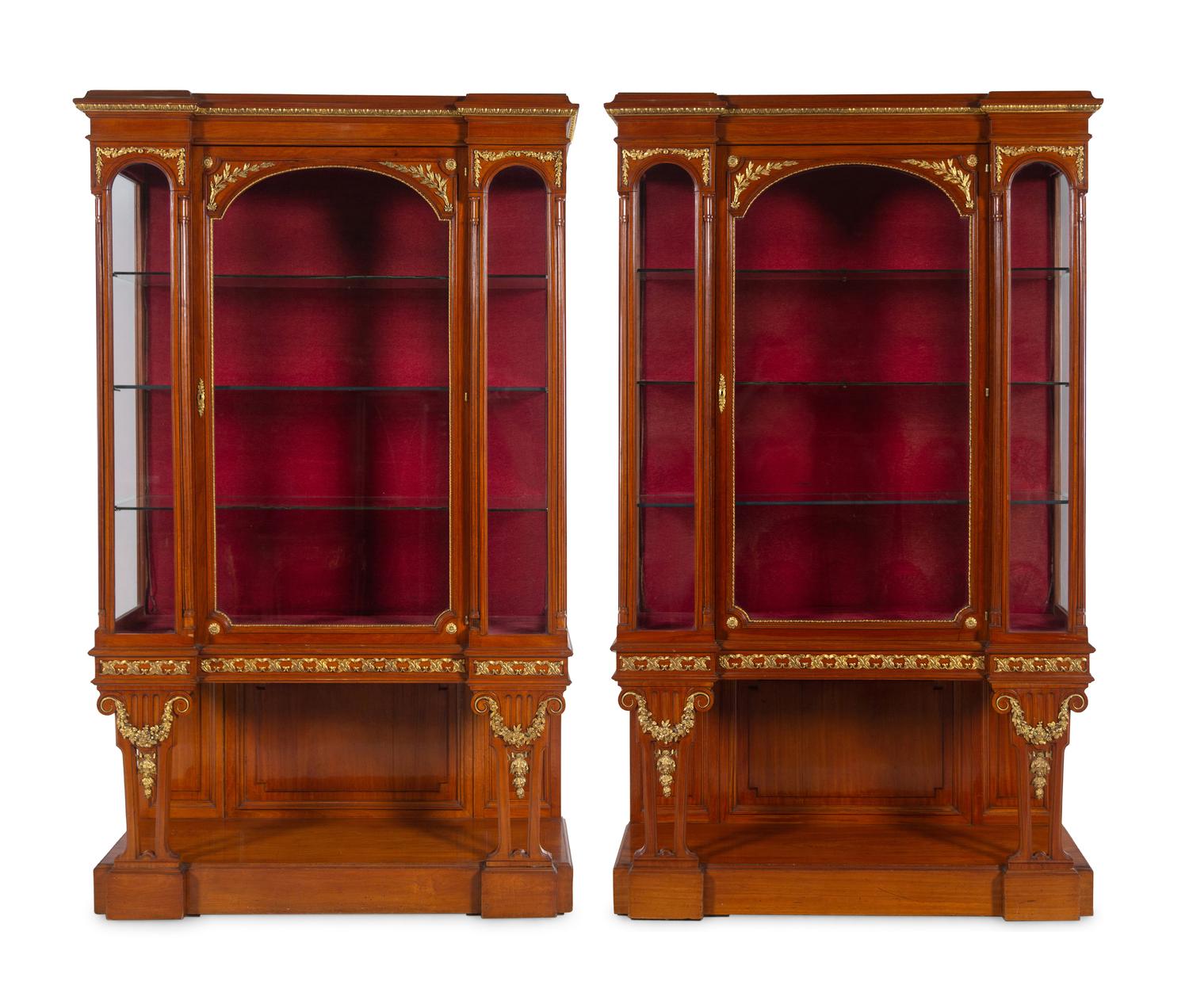 A Pair of Louis XVI Style Gilt Bronze and Metal Mounted Walnut Vitrine Cabinets