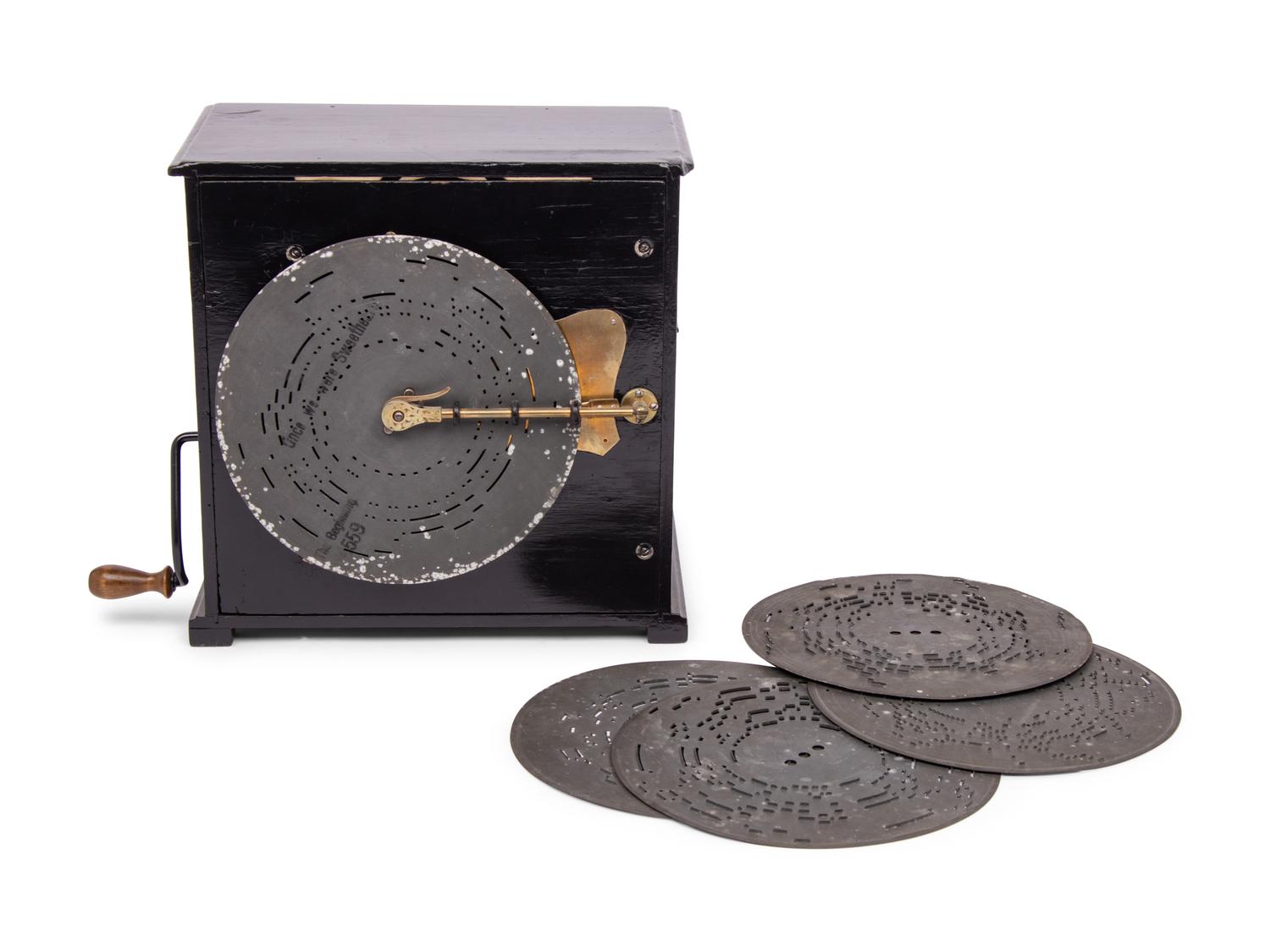 An Amorette Automaton Sixteen Key Organette with 8 3/4 Inch Disks
