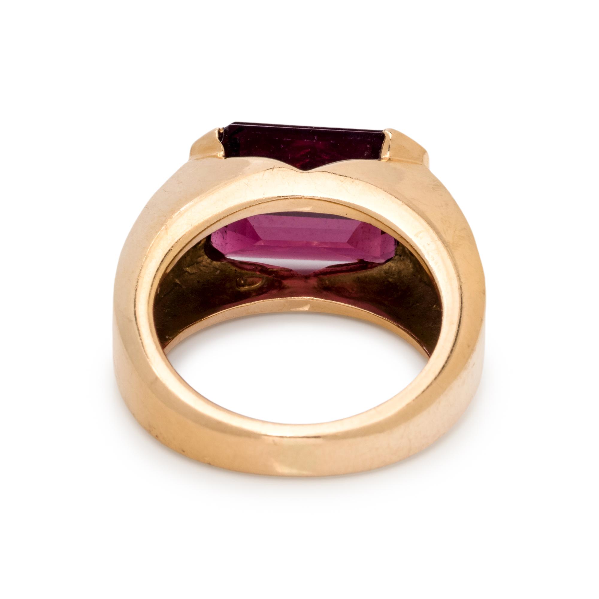 MOVADO, GARNET AND DIAMOND RING