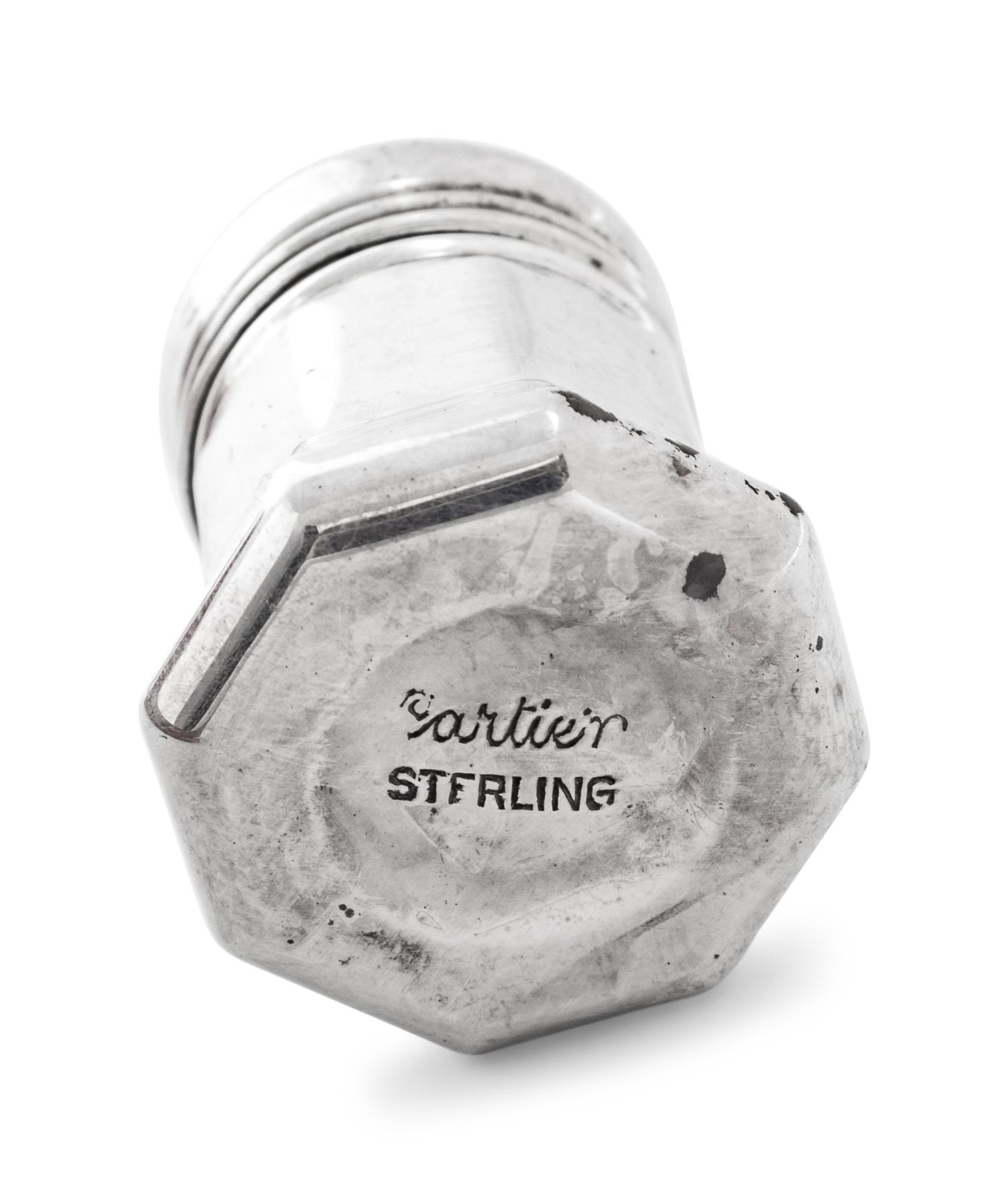 A Set of Sixteen Cartier Silver Casters