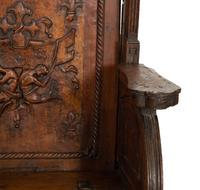 A Near Pair of Late Gothic Walnut and Oak Choir Stalls