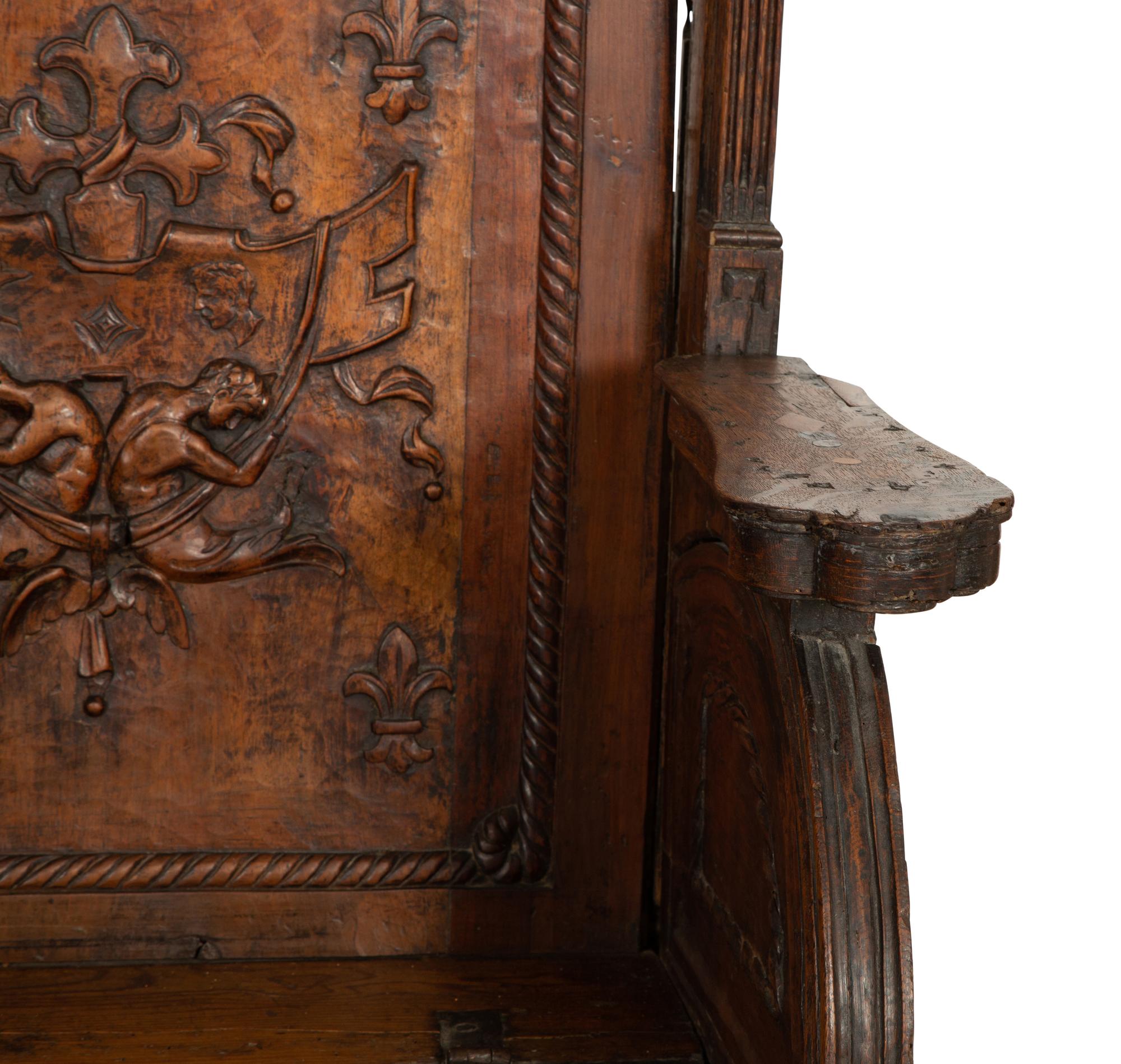 A Near Pair of Late Gothic Walnut and Oak Choir Stalls