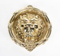 A Polished Brass Metal Lion Head Door Knocker Diameter 8 1/2 inches. — 20TH CENTURY