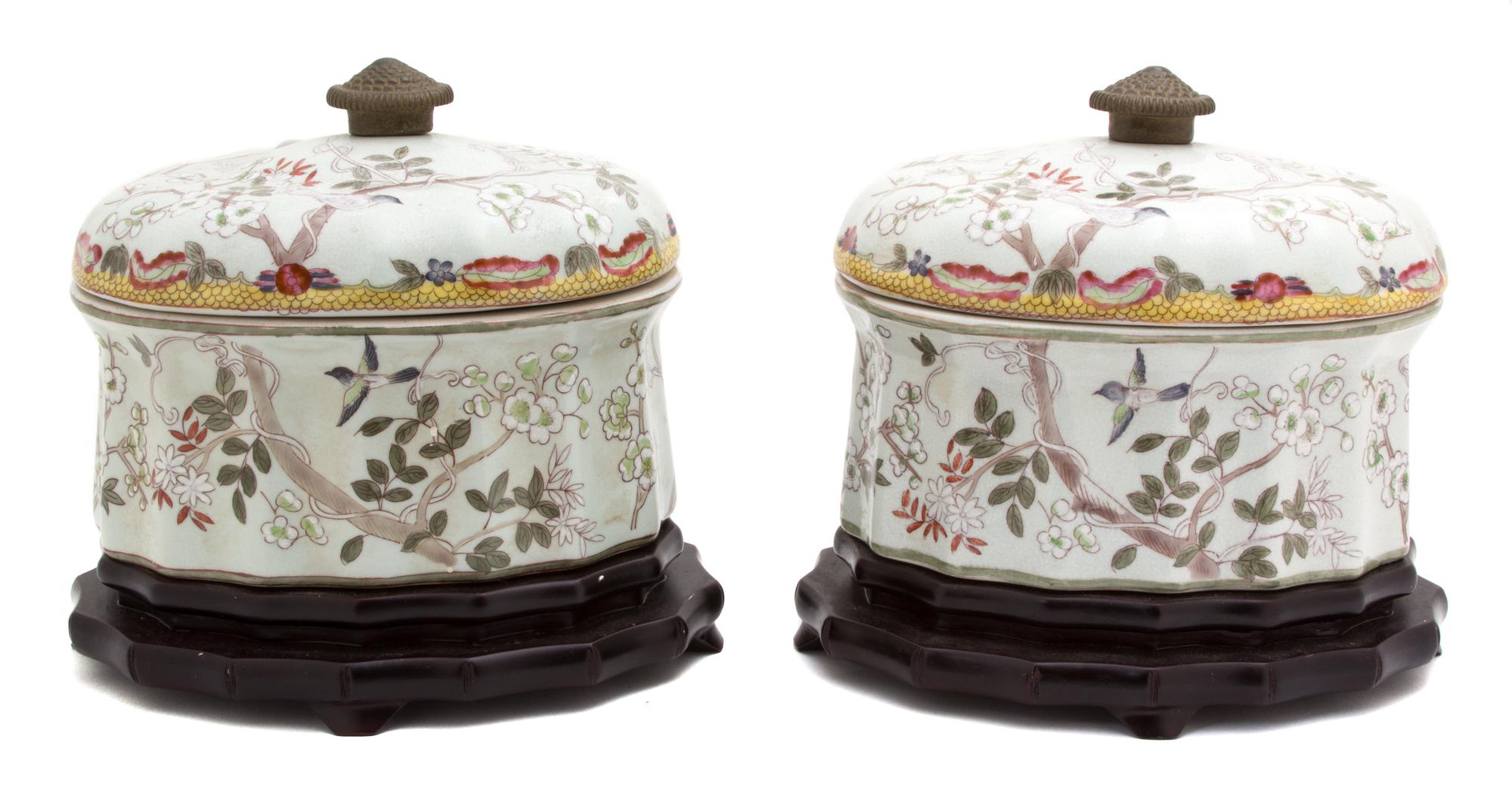 A Pair of Continental Glazed Ceramic Cartouche-Form Covered Boxes Height 7 1/2 x width 7 x depth 8 inches. — 20TH CENTURY