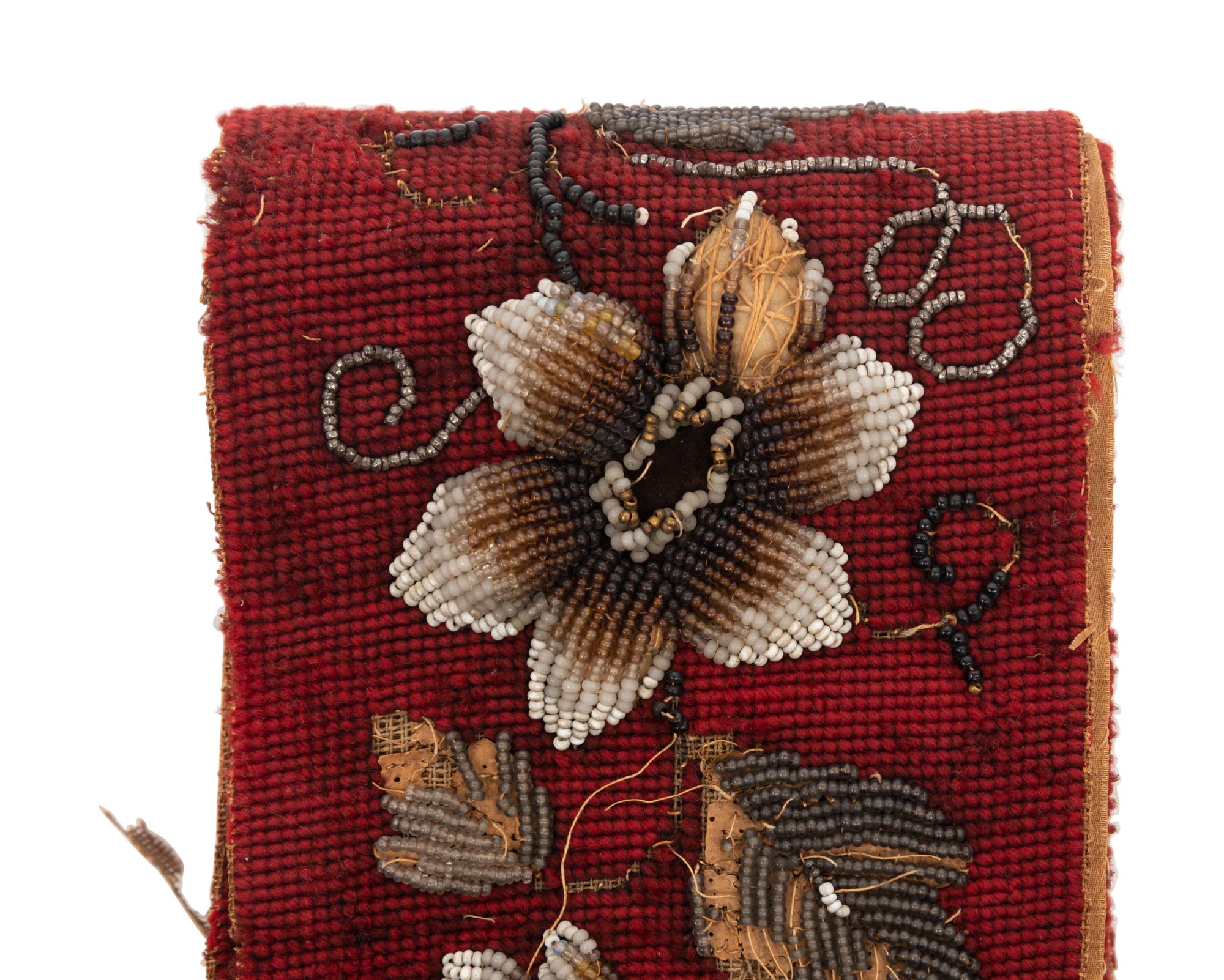 A Victorian Beaded Bell Pull with Bronze Mounts