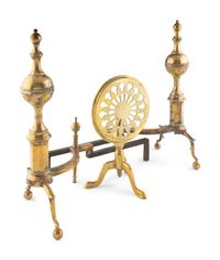 A Pair of Brass Andirons and a Fireplace Trivet