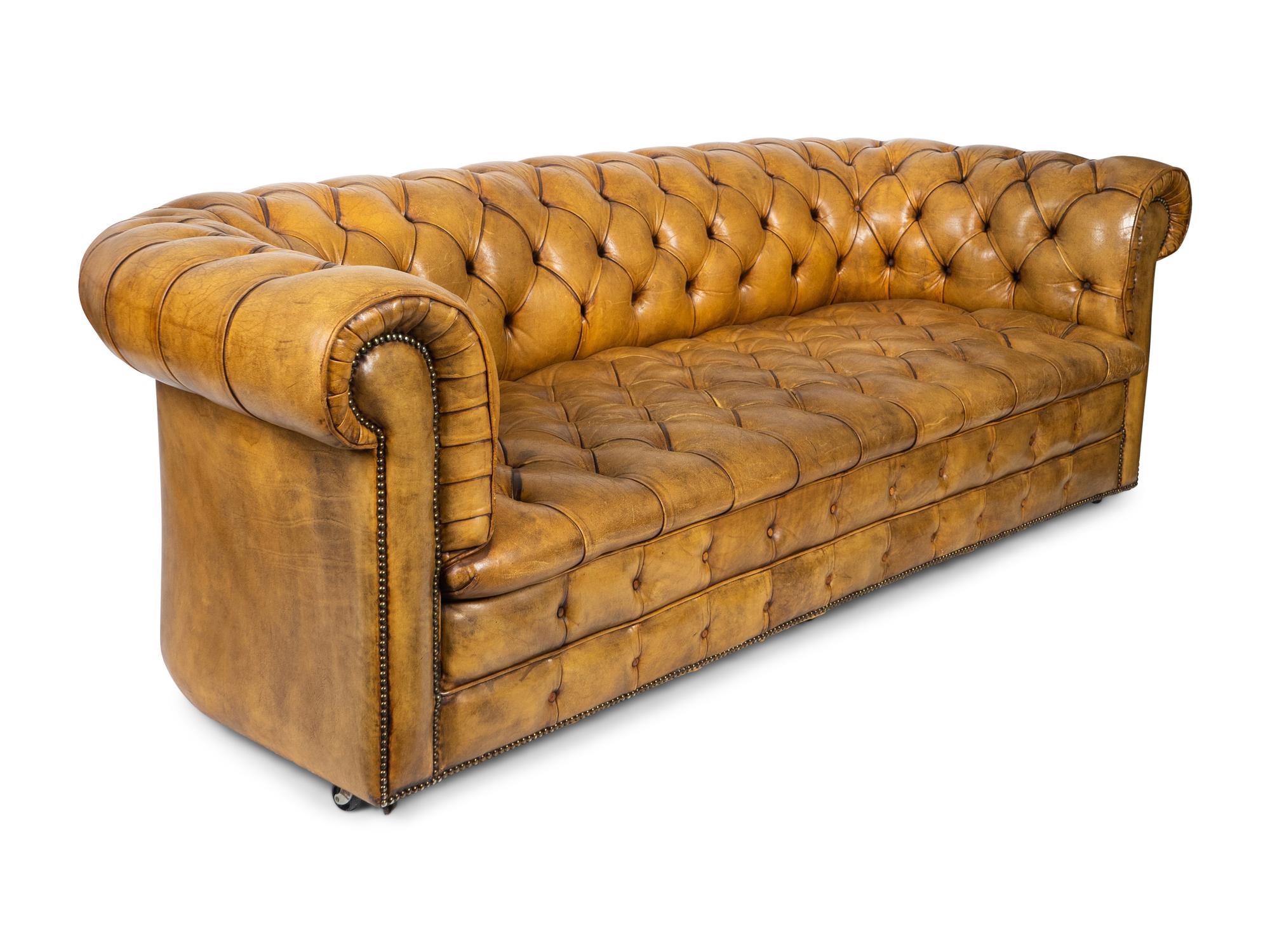 An English Edwardian Tufted Leather Chesterfield Sofa — 20TH CENTURY