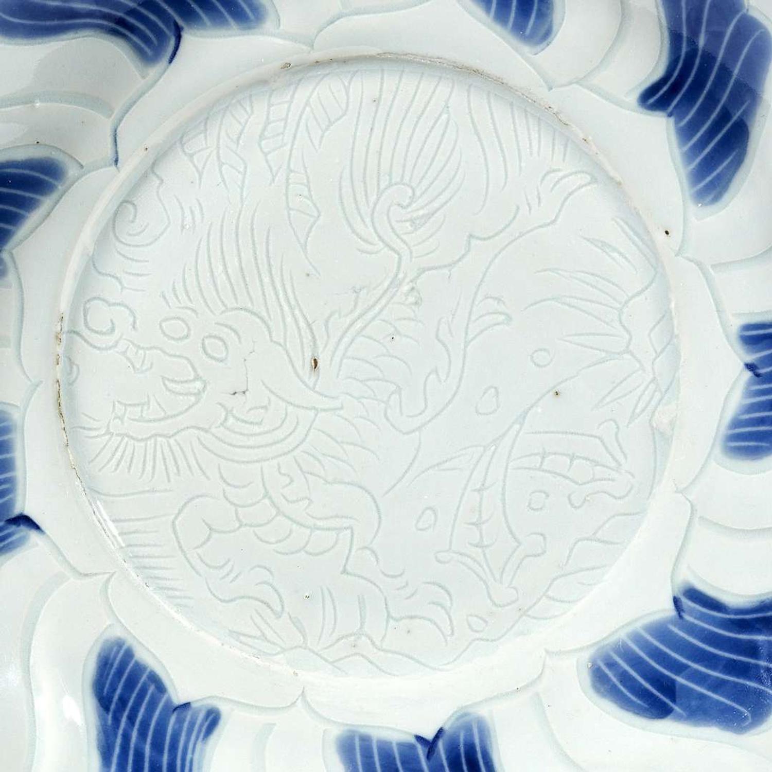 A pair of Chinese blue and white porcelain incised dishes Ming Dynasty