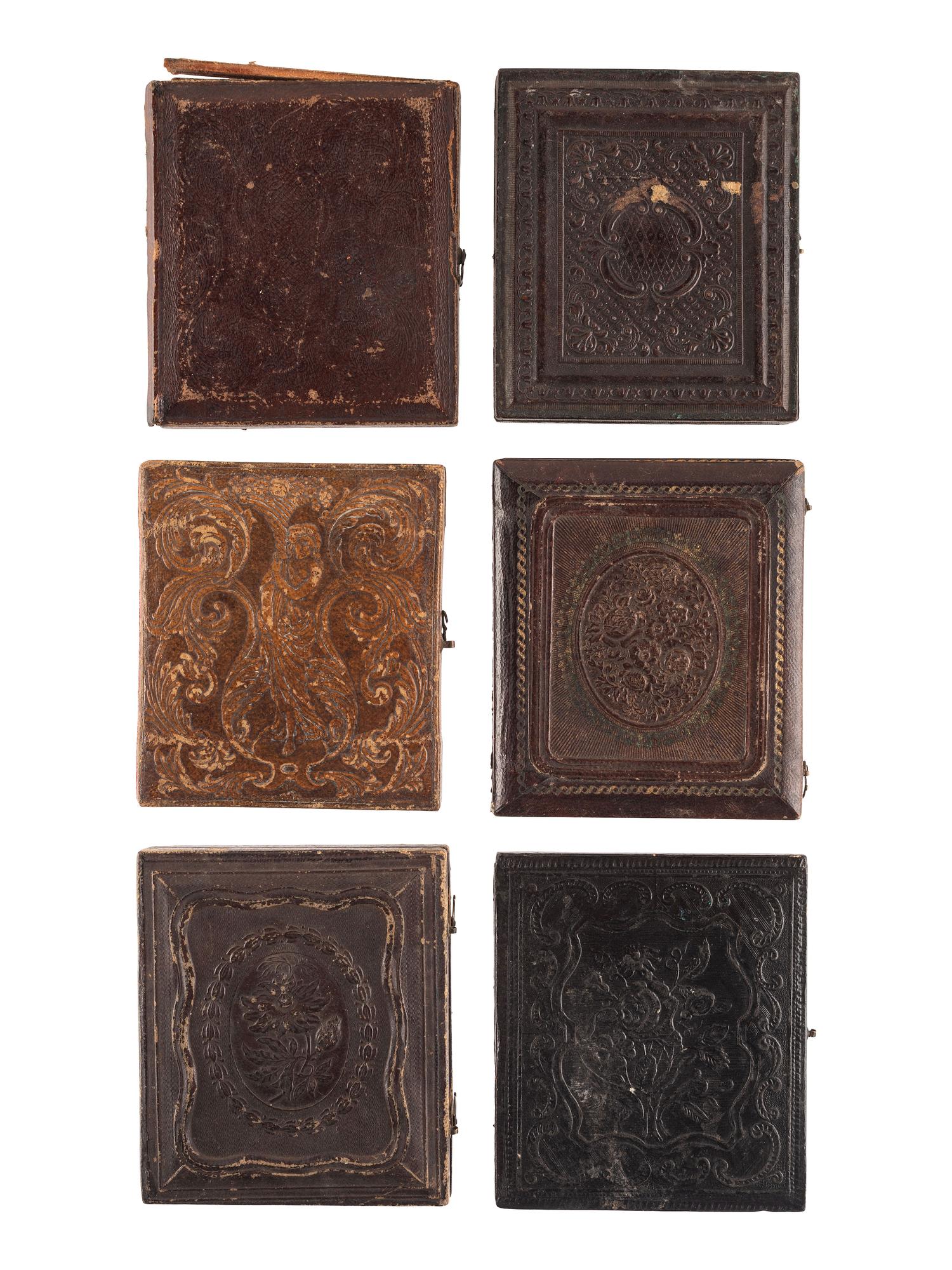 [EARLY PHOTOGRAPHY]. A group of 33 daguerreotypes, ambrotypes, tintypes, and CDVs of men of varying ages, including: