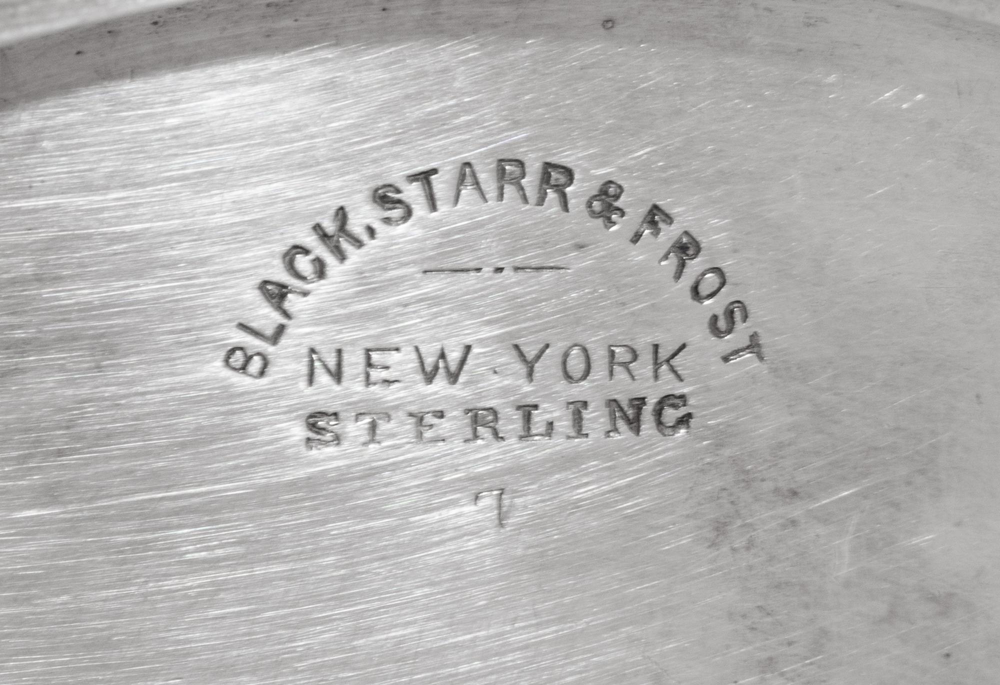 A Group of Three S. Kirk and Son Repousse Silver Dishes