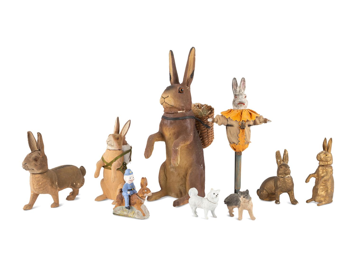 A Collection of German Papier-Mâché Easter Bunnies and Other Figural Candy Canisters