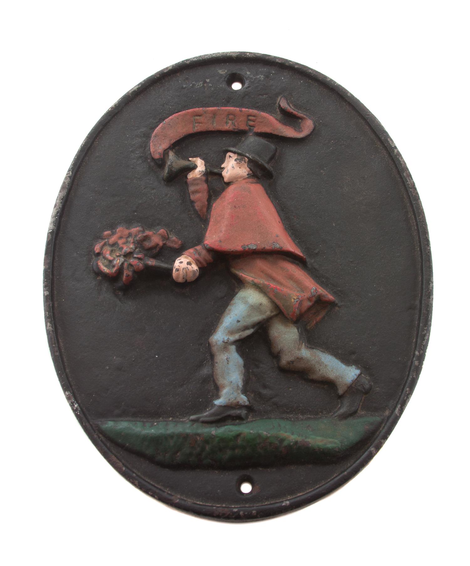 A Cast Iron Fire Mark Height 11 1/4 x width 9 inches.