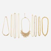 A collection of nine gold necklaces