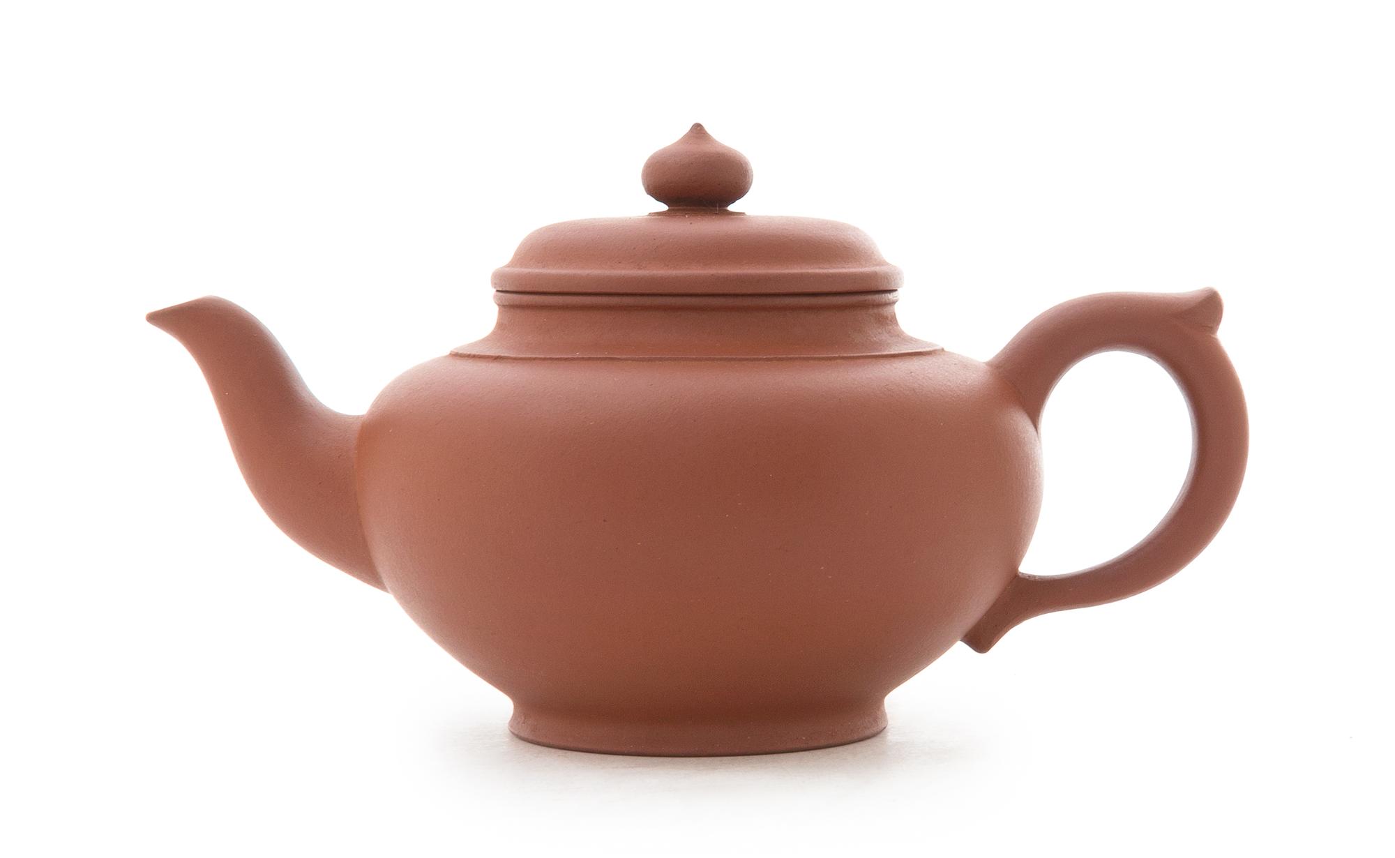 A Yixing Pottery Teapot Hieght 4 1/8 inches.
