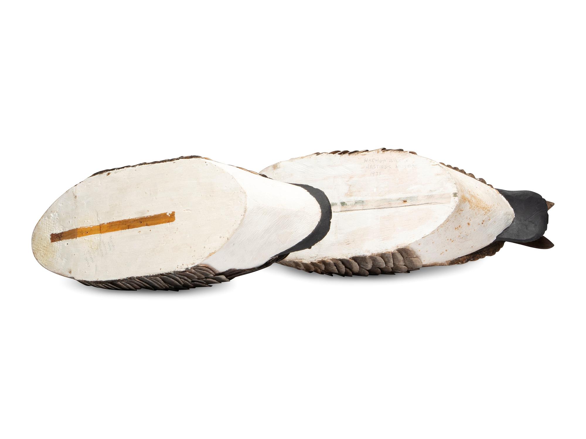 A Pair of Hollow Carved and Painted Wood Canada Goose Decoys