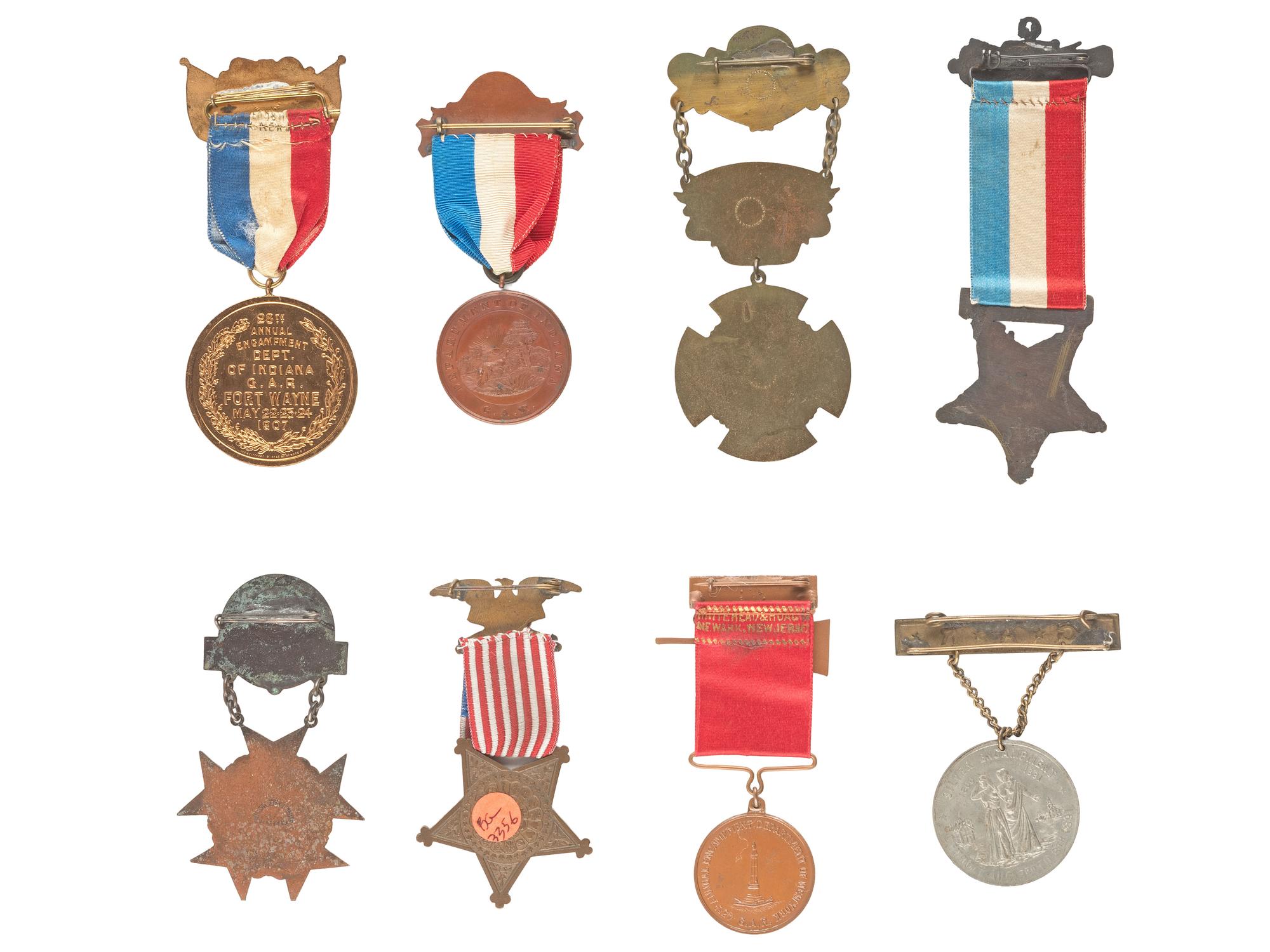[CIVIL WAR]. 21 GAR ribbons and badges representing various regiments, incl. 146 NY Vols.