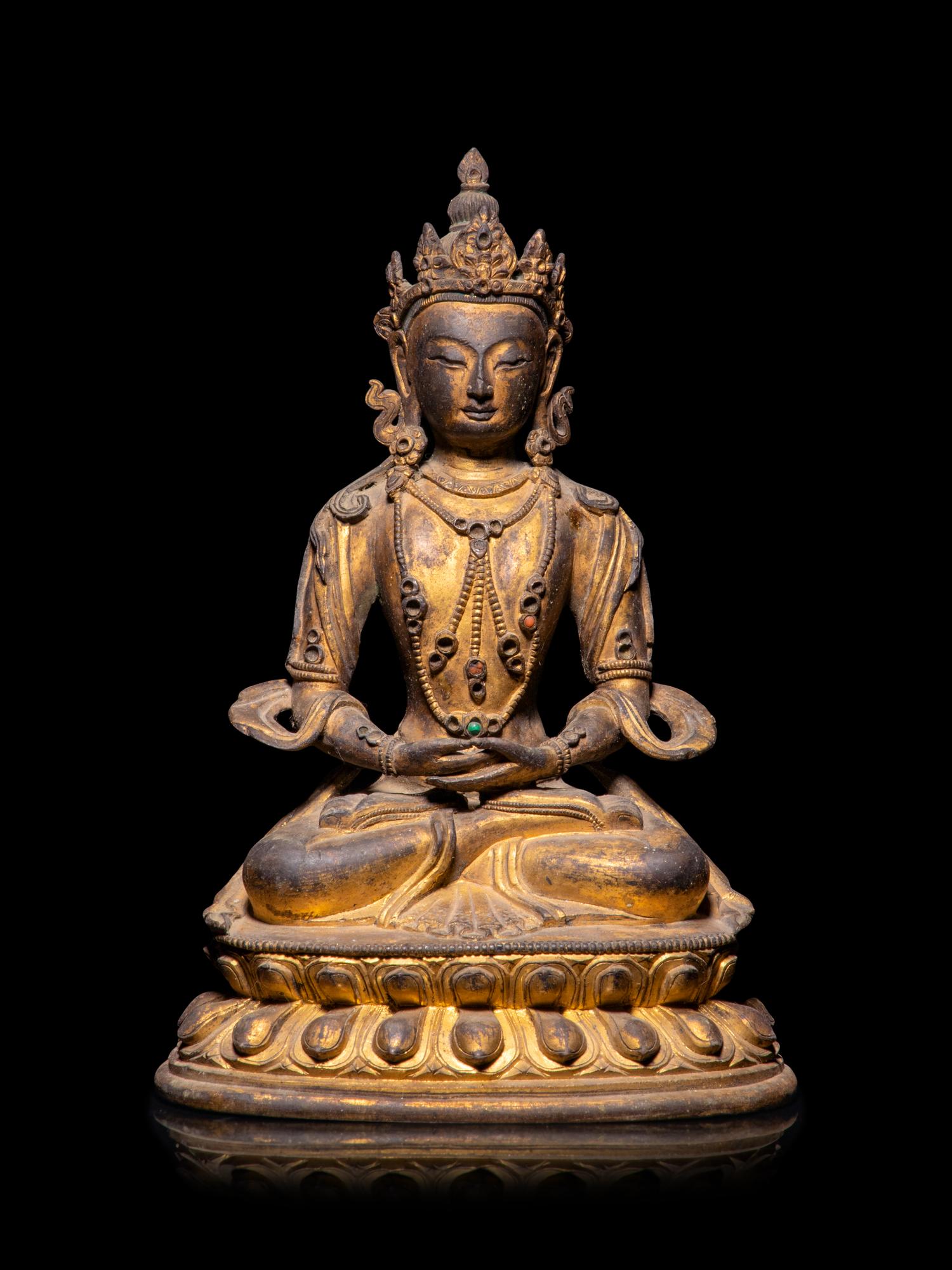 A Sino-Tibetan Gilt Bronze Figure of Amitayus