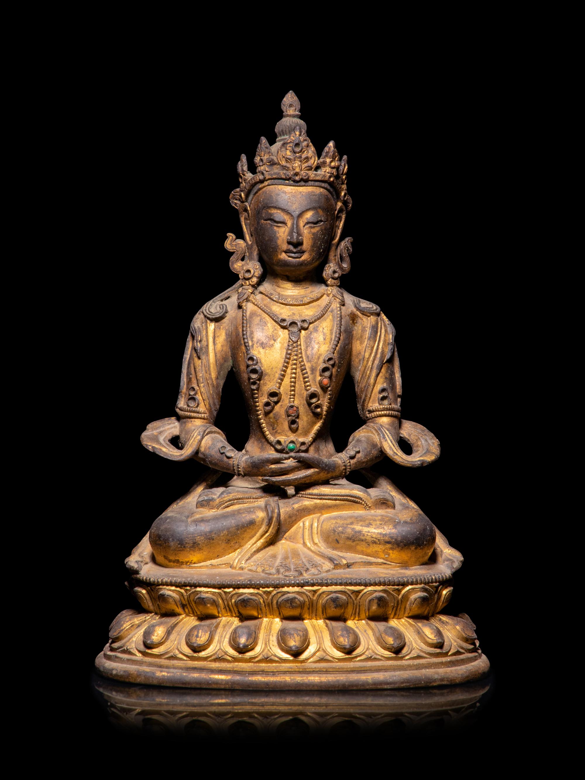 A Sino-Tibetan Gilt Bronze Figure of Amitayus