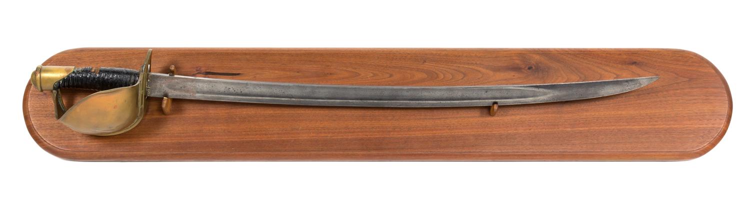 A Brass and Wooden Handle Cutlass Sword on a Mahogany Backboard Length 24 inches.