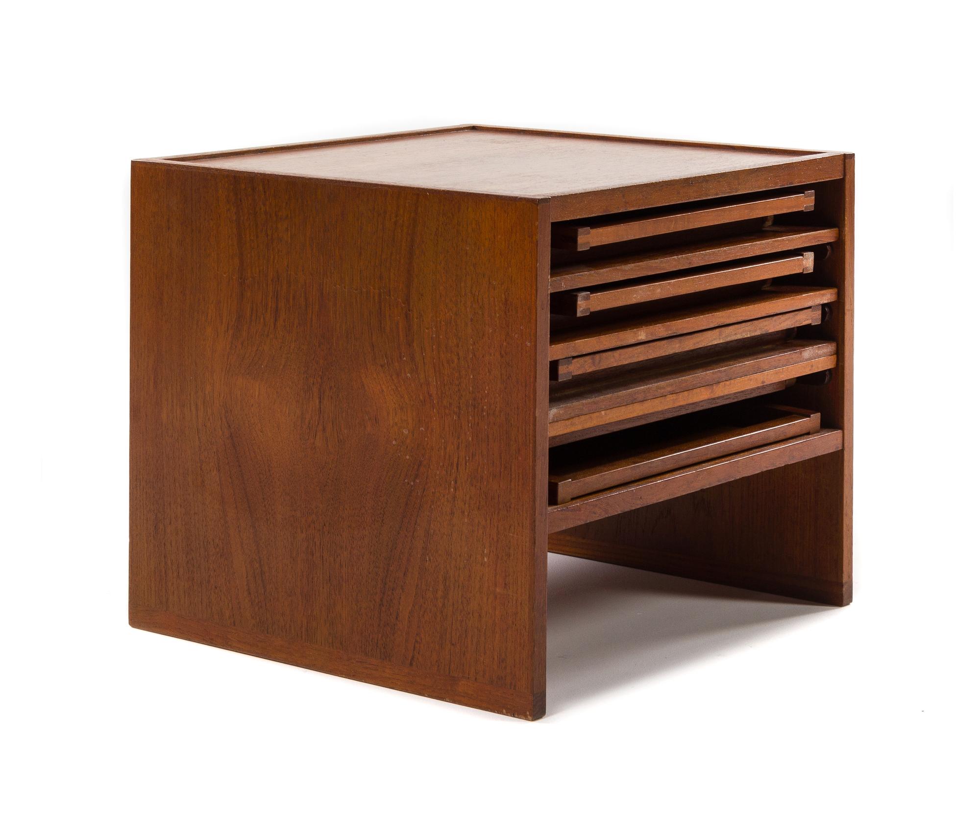 Aksel Kjersgaard, DENMARK, 1960s, a set of four collapsible side tables, fitted into a similar storage cube