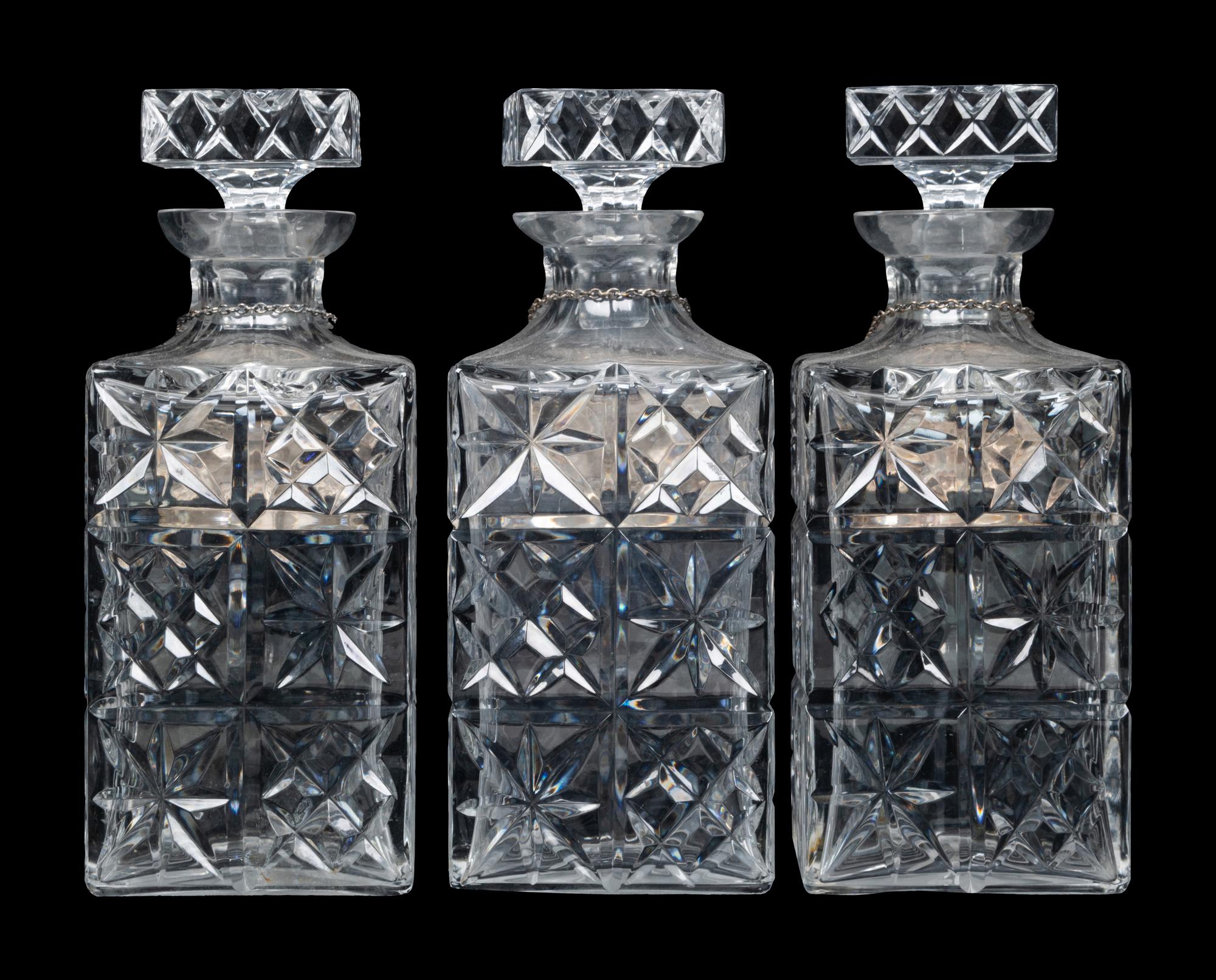 Three Cut Glass Decanters
