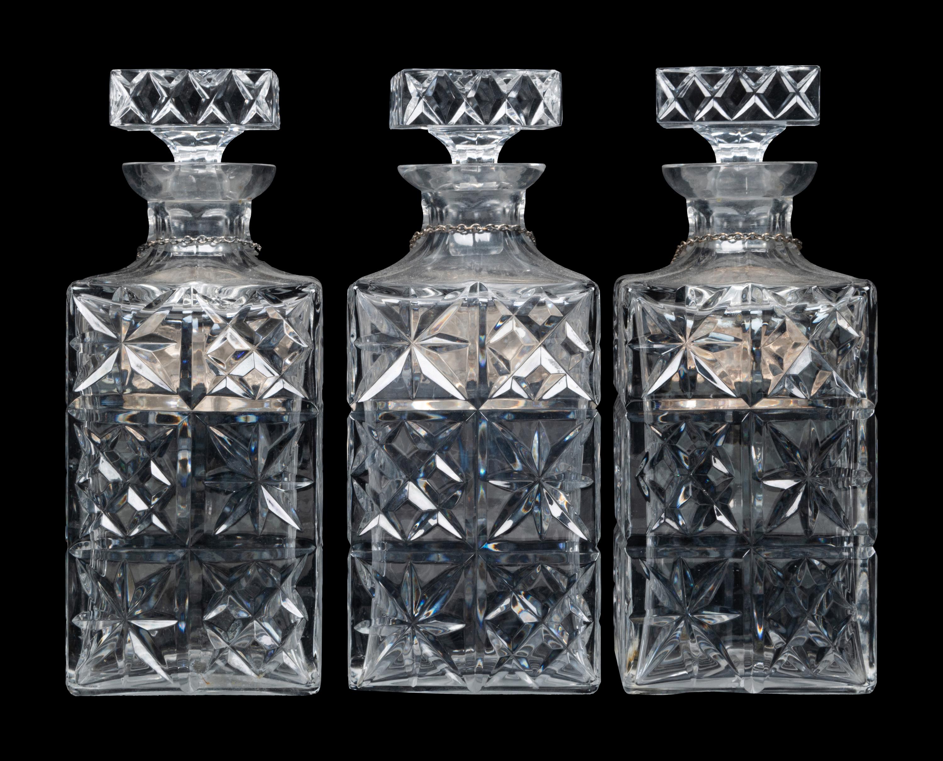 Three Cut Glass Decanters