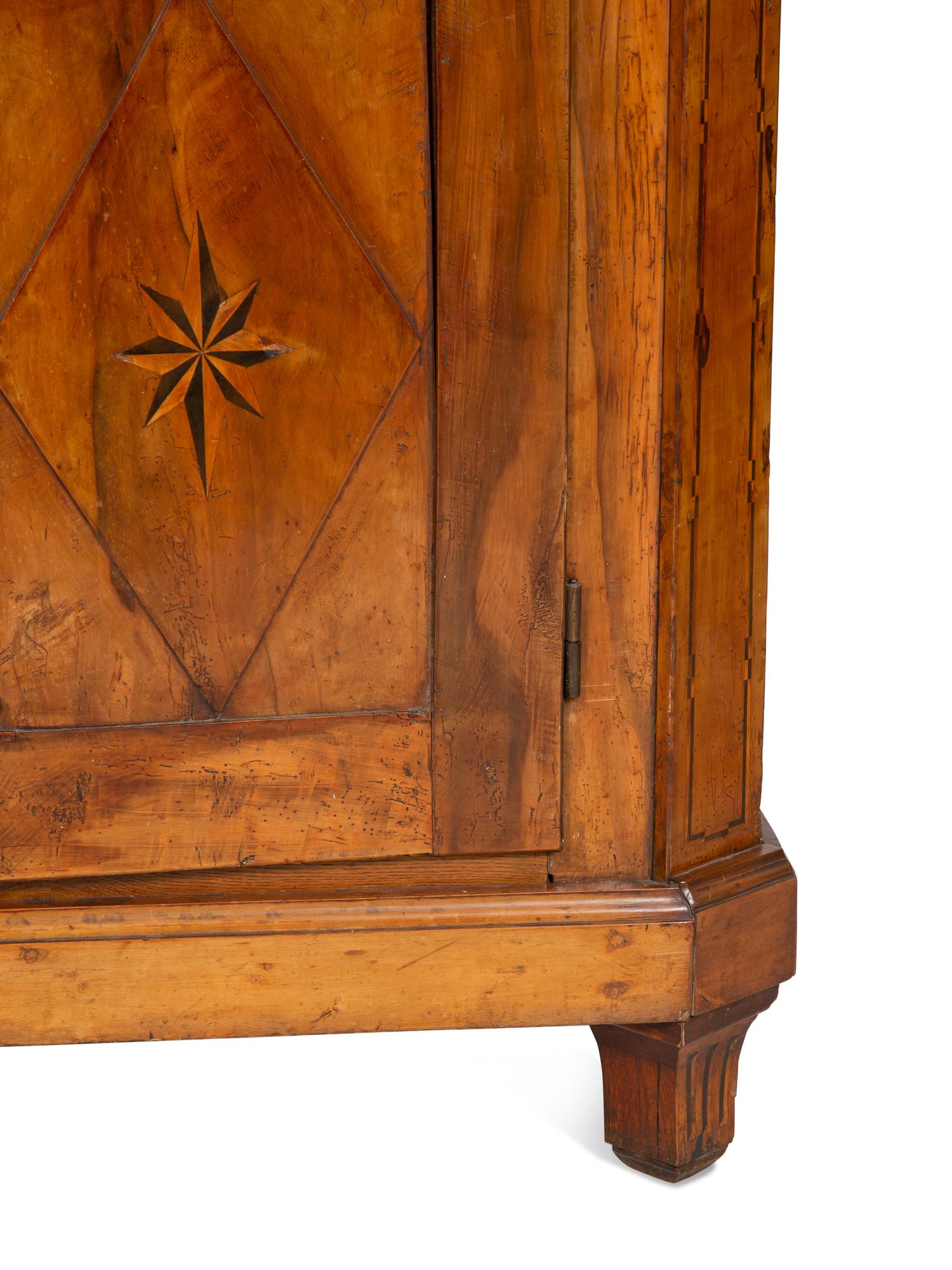 A Continental Olivewood Armoire