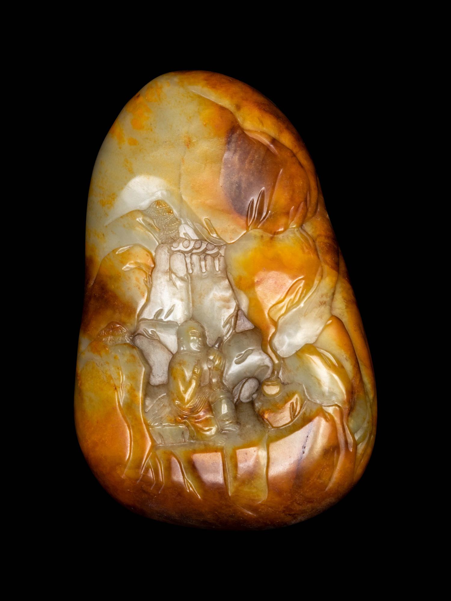 A Chinese Celadon, Russet and Yellow Jade Boulder