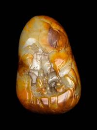 A Chinese Celadon, Russet and Yellow Jade Boulder