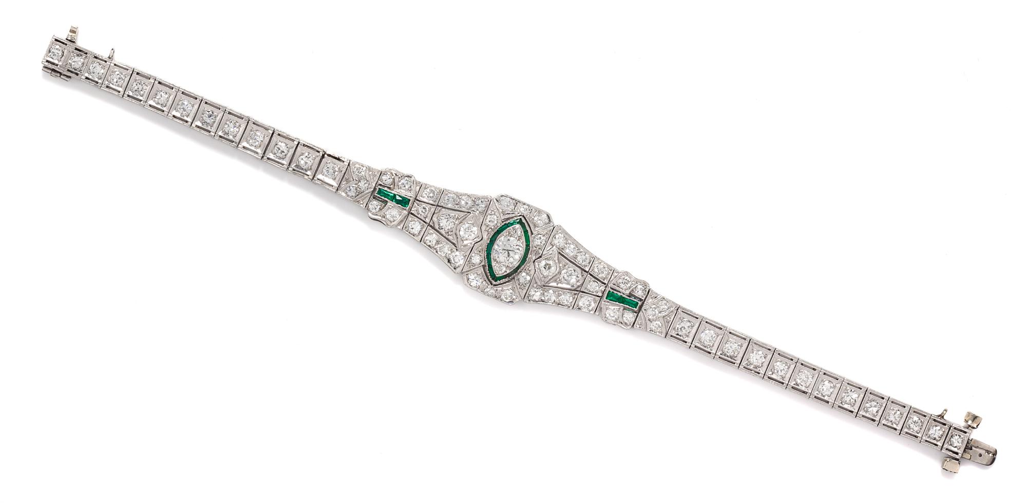 An Art Deco Platinum, Diamond and Simulated Emerald Bracelet, 13.50 dwts.