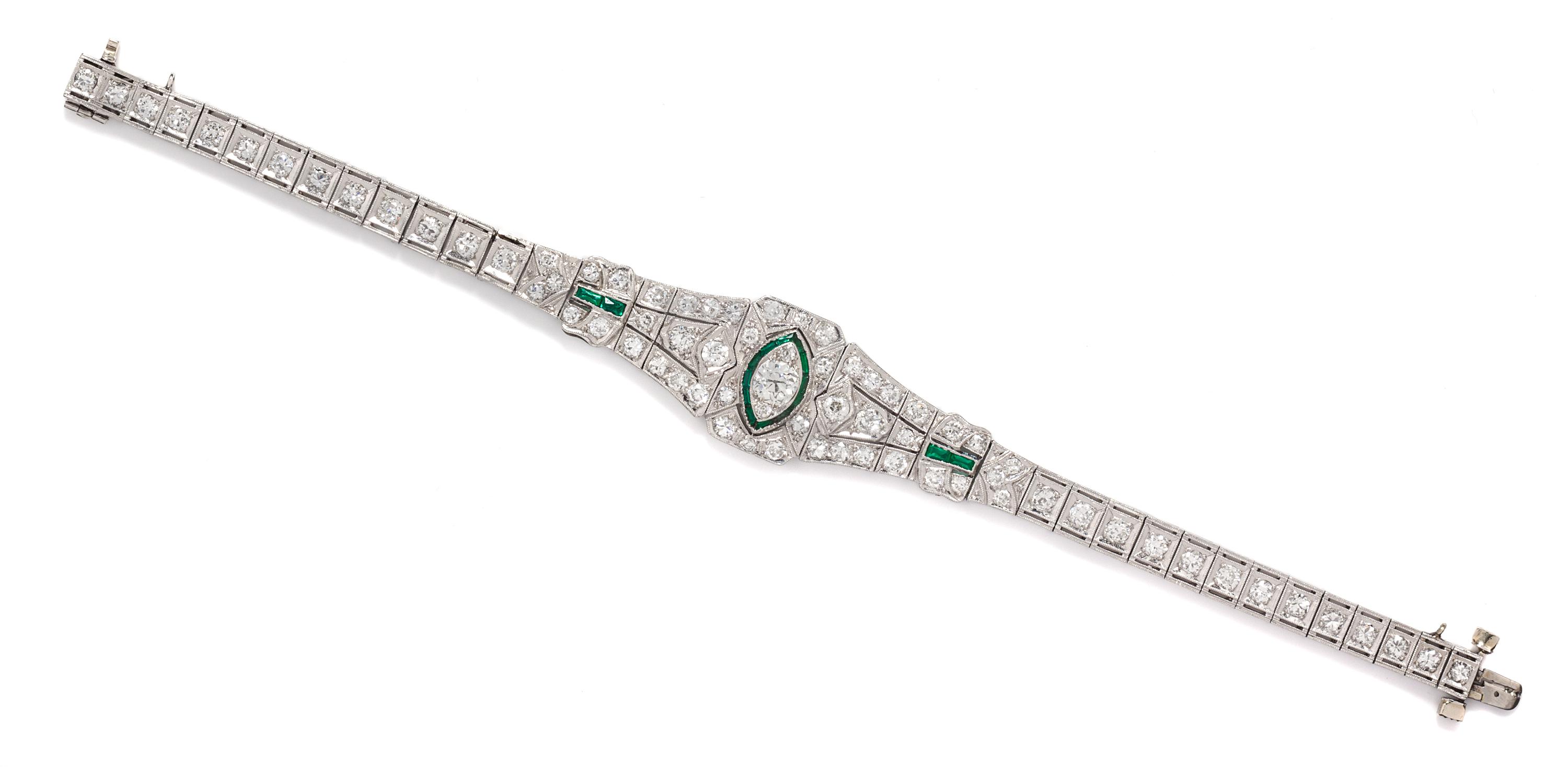 An Art Deco Platinum, Diamond and Simulated Emerald Bracelet, 13.50 dwts.