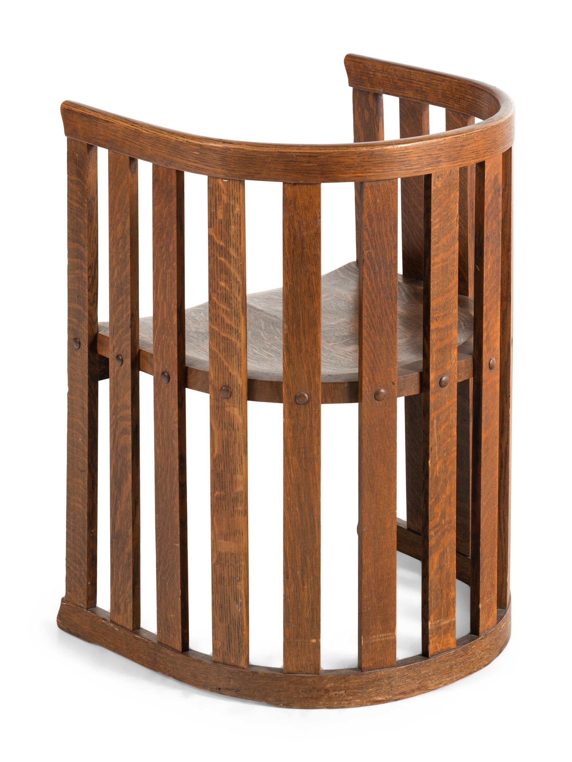 An Arts and Crafts Oak Armchair