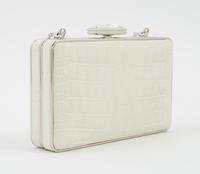 A Judith Leiber Cream Crocodile Clutch, 6" x 3.5" x 1.5".