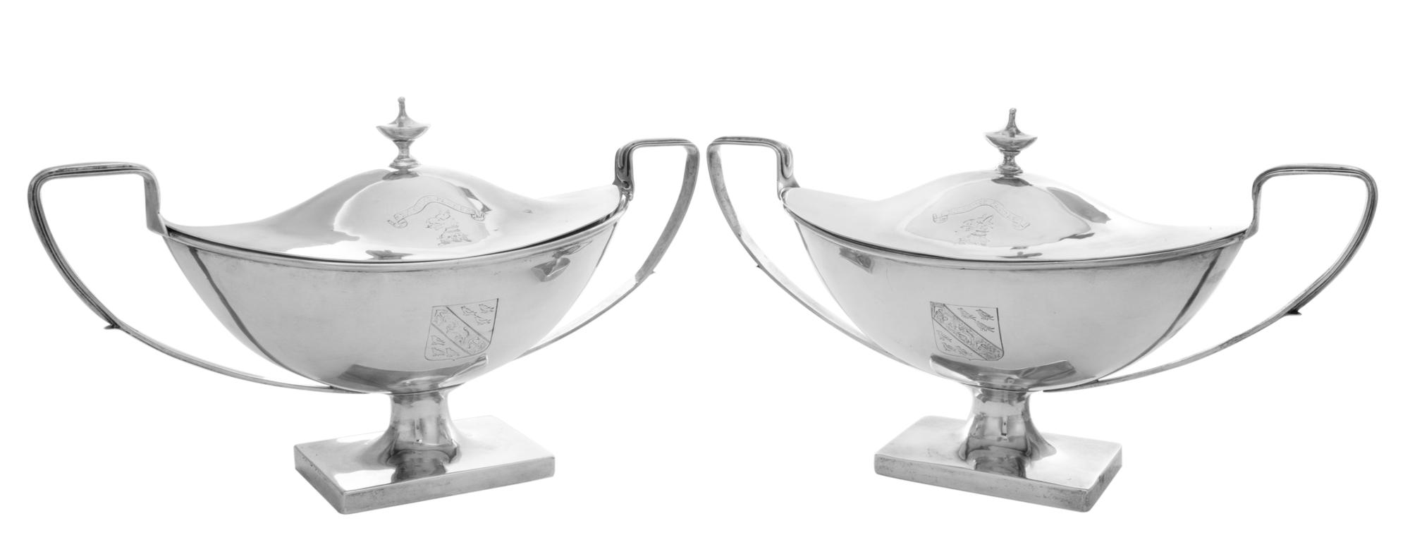 A Pair of American Silver Covered Sauce Tureens, , each of twin handled urn form surmounted by a conforming finial, the lid bearing the