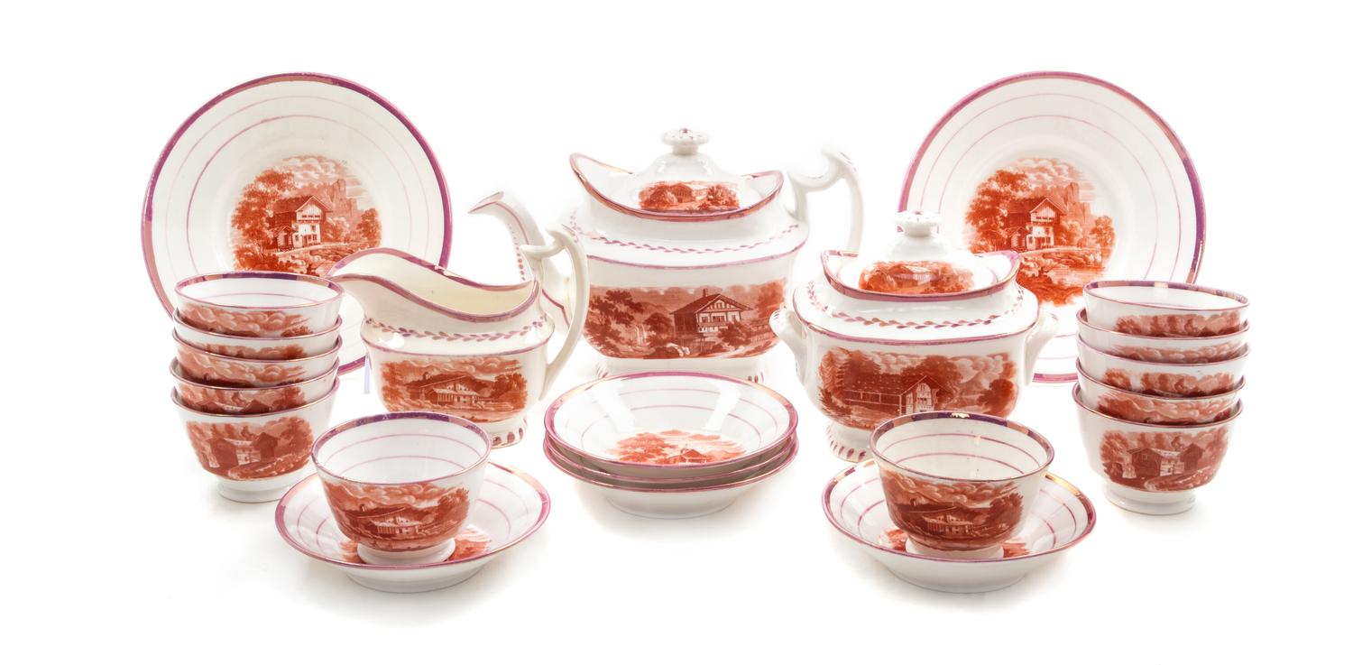 An English Porcelain Lusterware Partial Desert Service, Height of teapot 6 1/2 x width 10 inches.