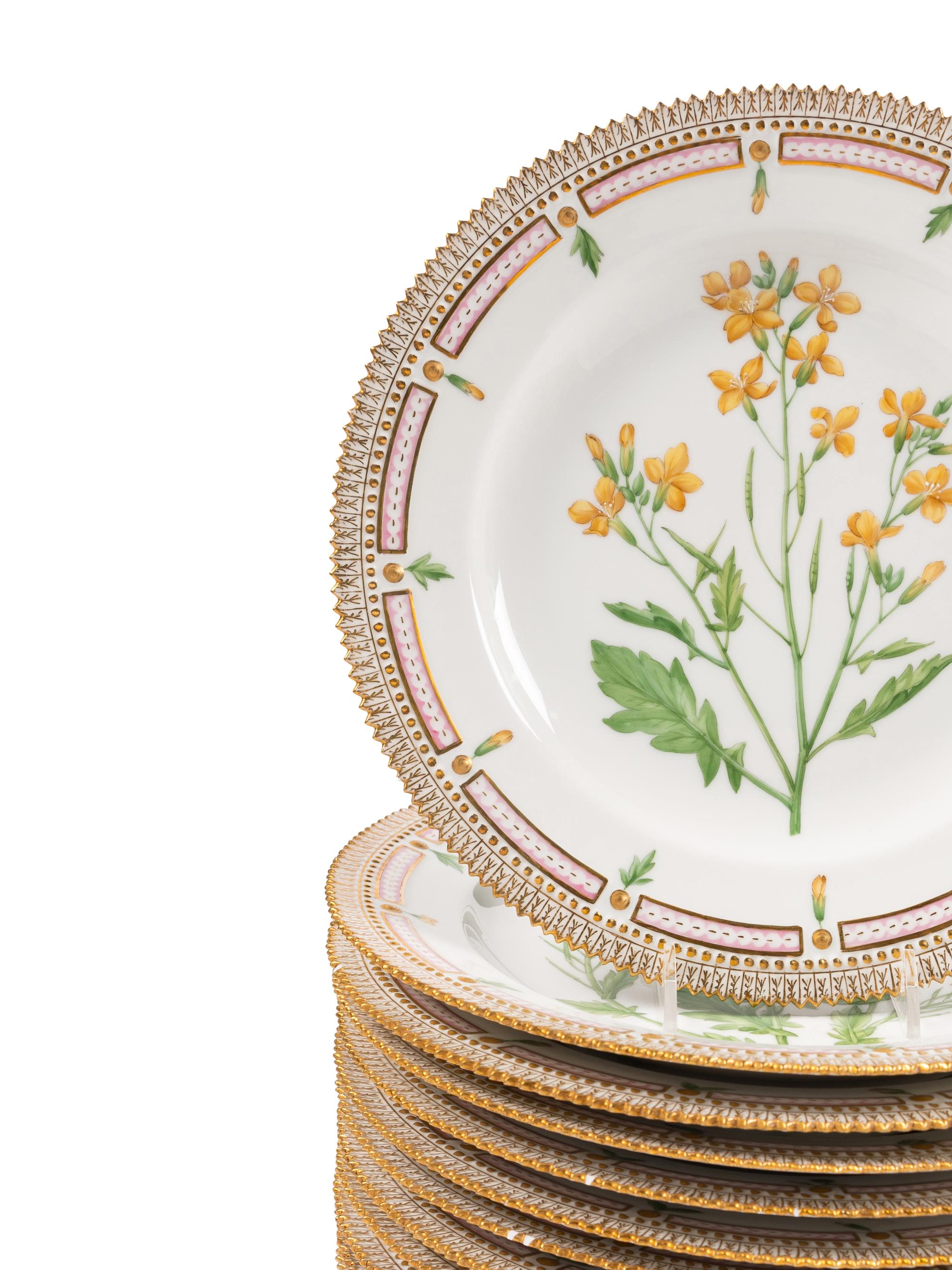 A Set of Twelve Royal Copenhagen Porcelain Flora Danica Dinner Plates
