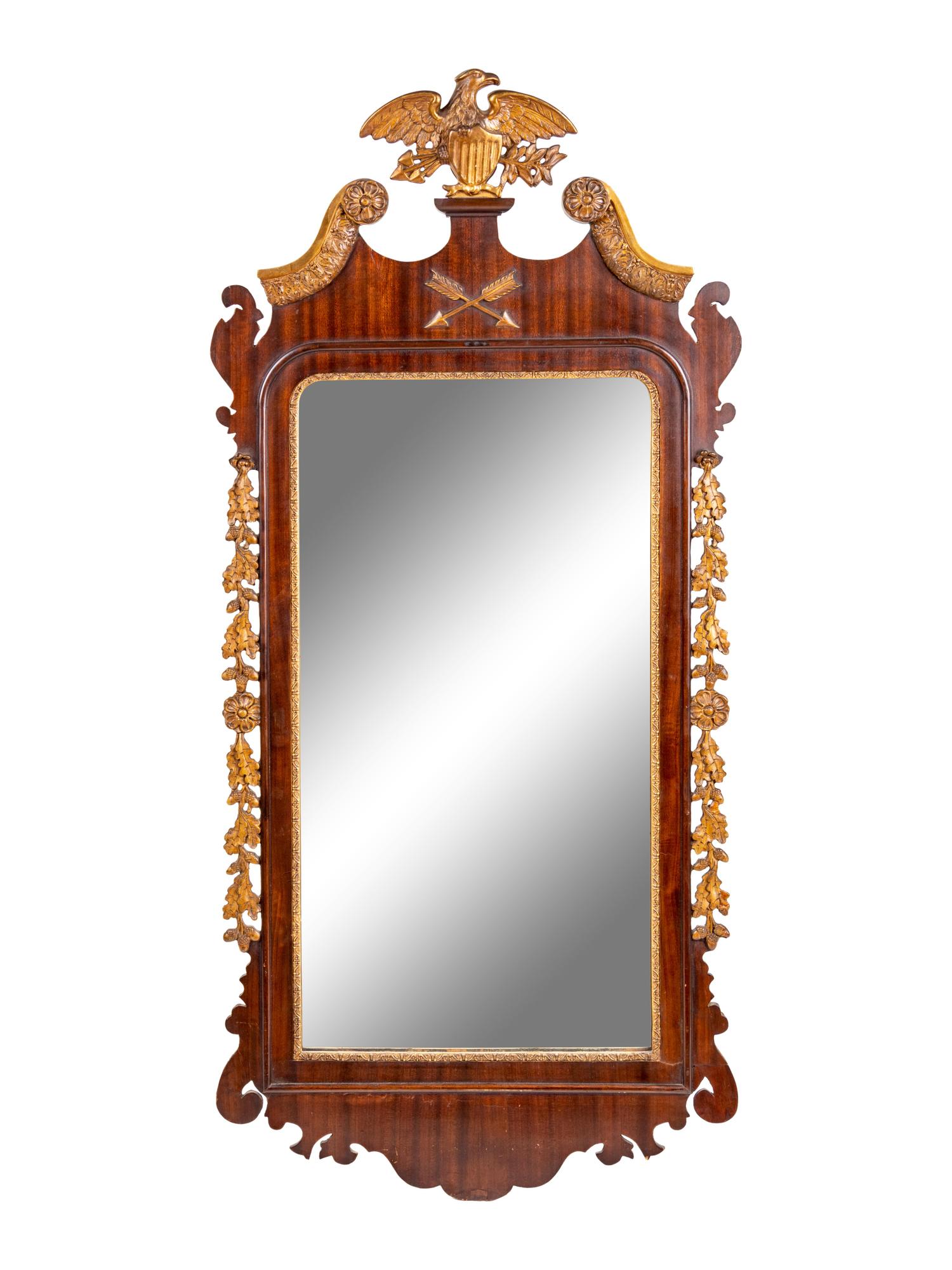 A Chippendale Style Parcel Gilt, Carved and Veneered Mahogany Looking Glass
