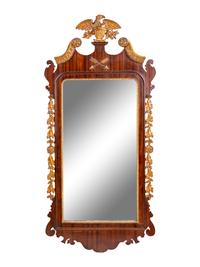 A Chippendale Style Parcel Gilt, Carved and Veneered Mahogany Looking Glass