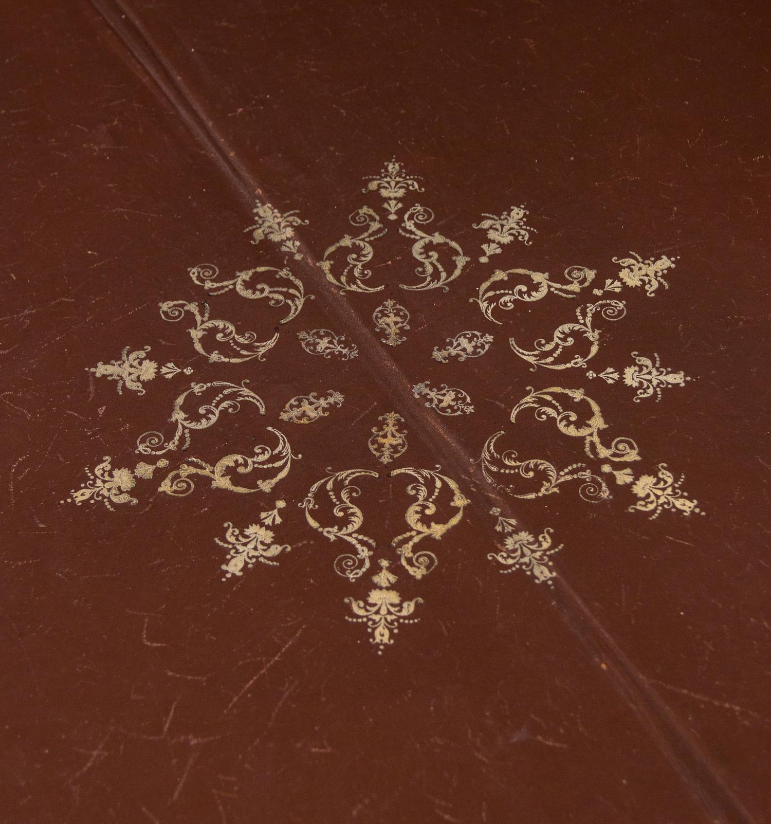 A Louis XV Style Gilt Bronze Mounted Tulipwood Flip-Top Writing Table