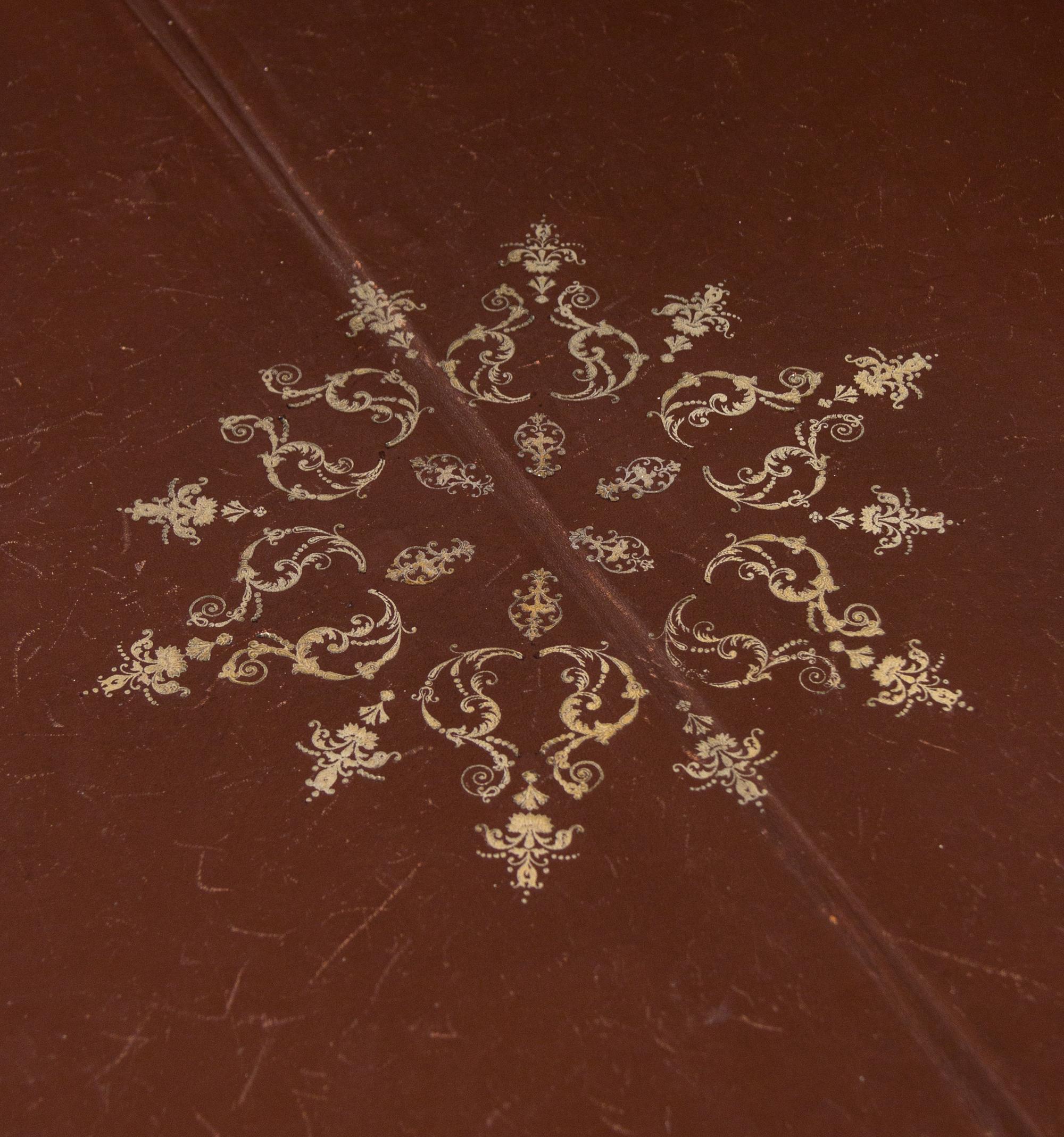 A Louis XV Style Gilt Bronze Mounted Tulipwood Flip-Top Writing Table