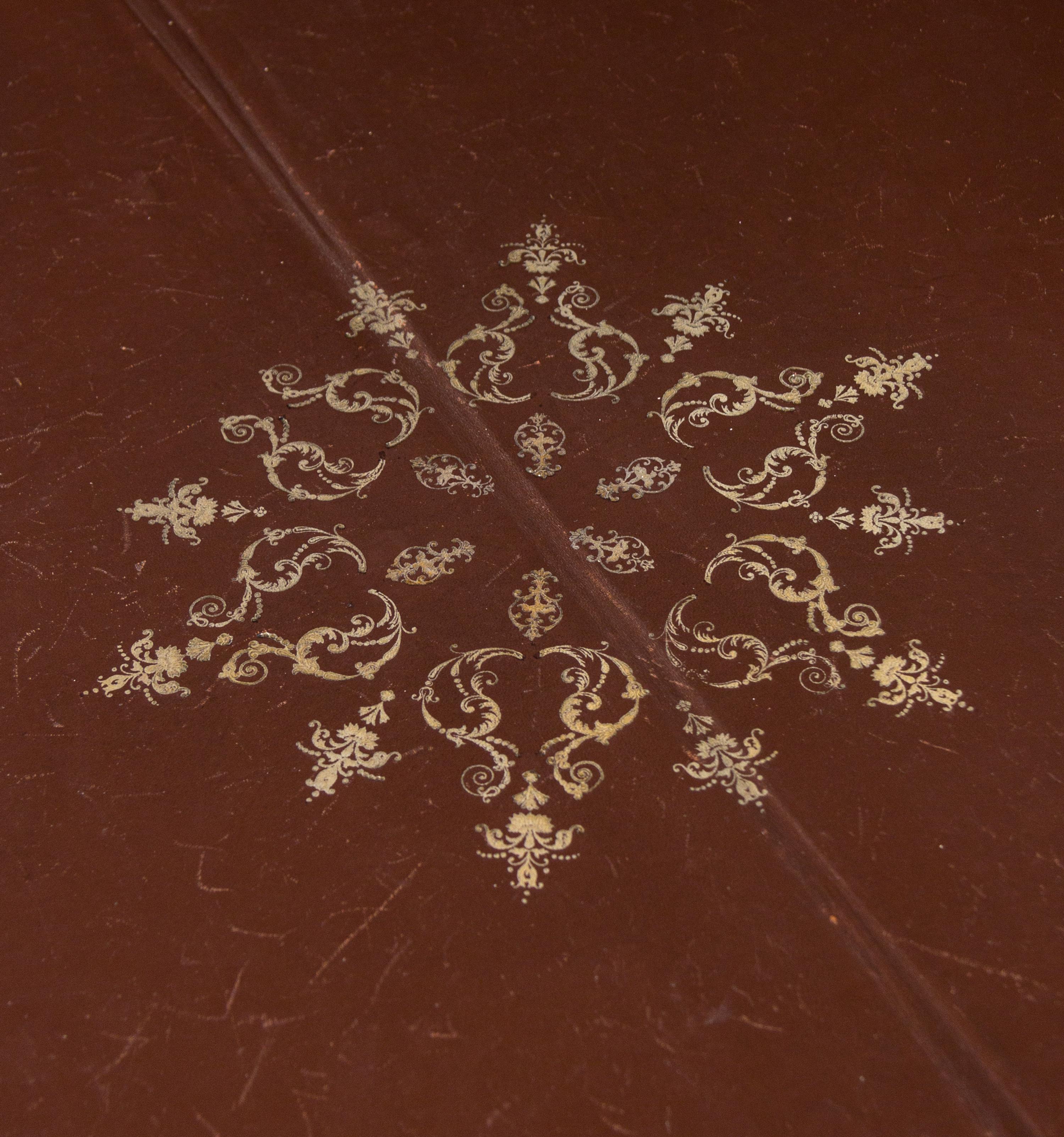 A Louis XV Style Gilt Bronze Mounted Tulipwood Flip-Top Writing Table