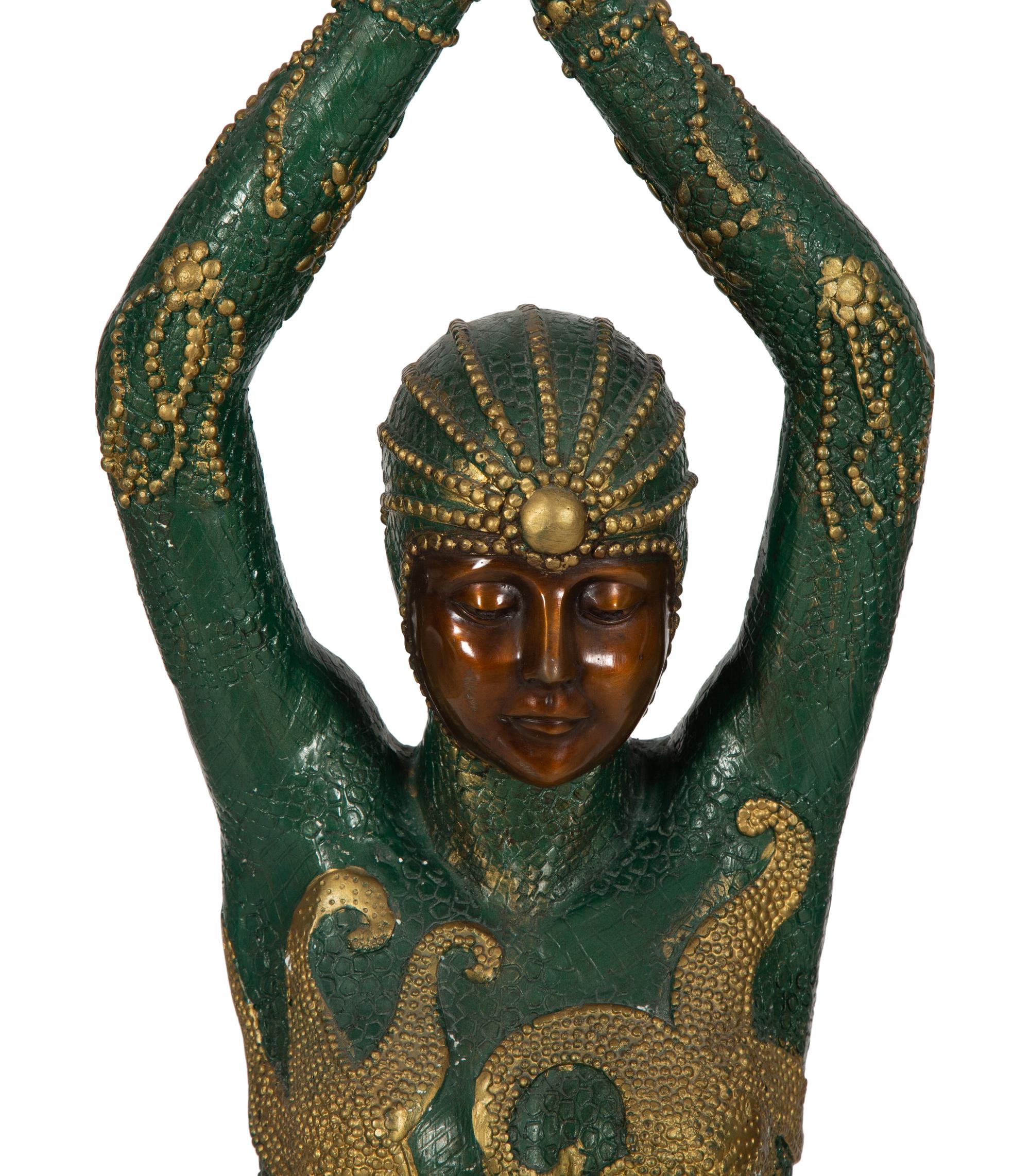A Polychromed Metal Figural Floor Lamp in the Style of Chiparus