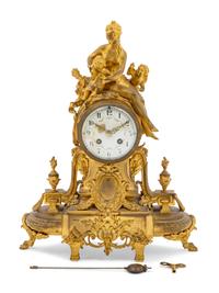 A French Gilt Bronze Figural Mantel Clock