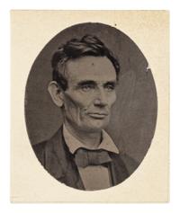 [LINCOLN-DOUGLAS DEBATES]. A pair of miniature photographs of Abraham Lincoln and Stephen A. Douglas, ca. 1860.